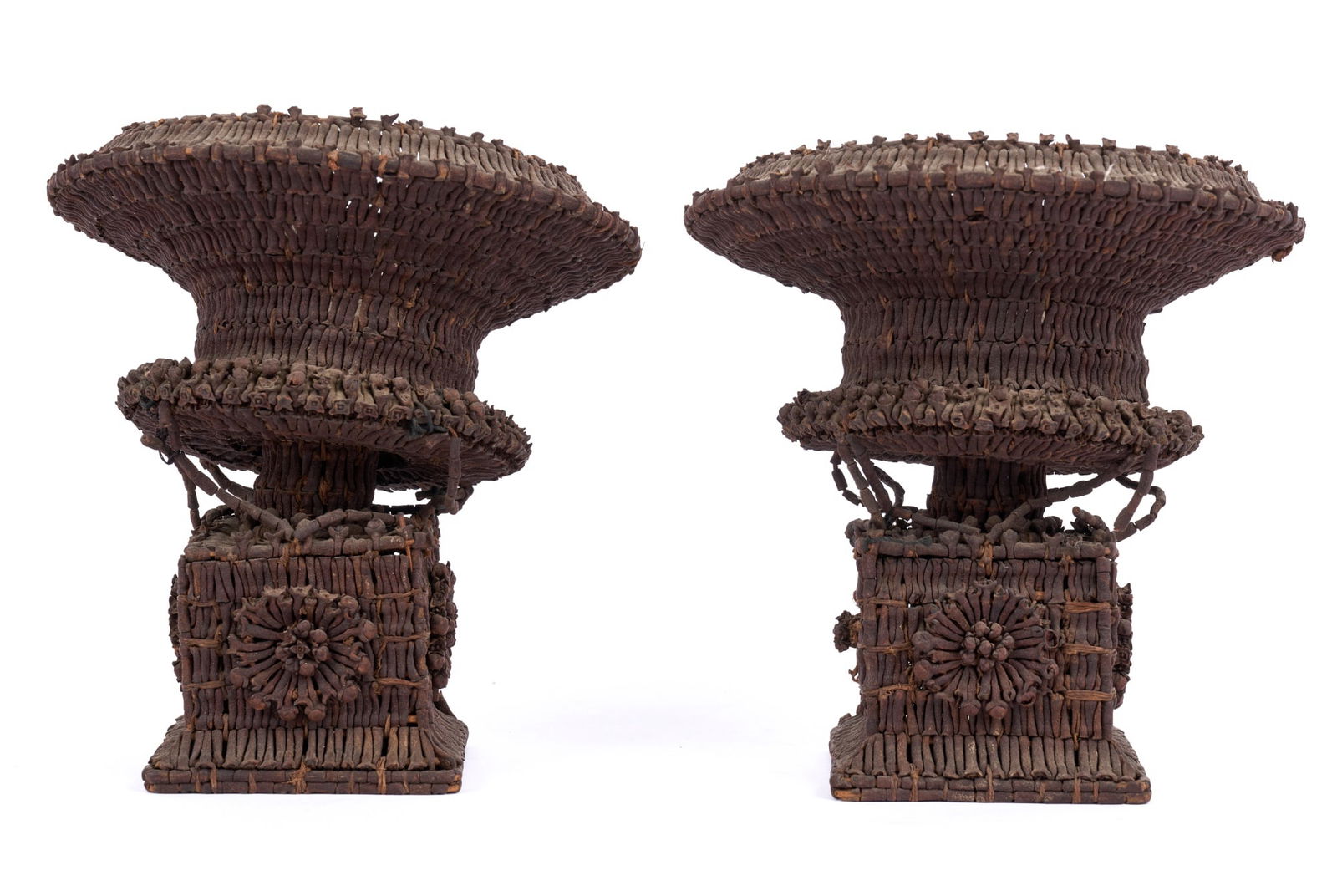 UNUSUAL PAIR of (19th c) FOLK ART CLOVE URNS: An unusual pair of (19th c) urns made entirely from cloves which retain their aroma. 5 1/4 x 5 1/2 inches. Condition: Good. Temp No 8397