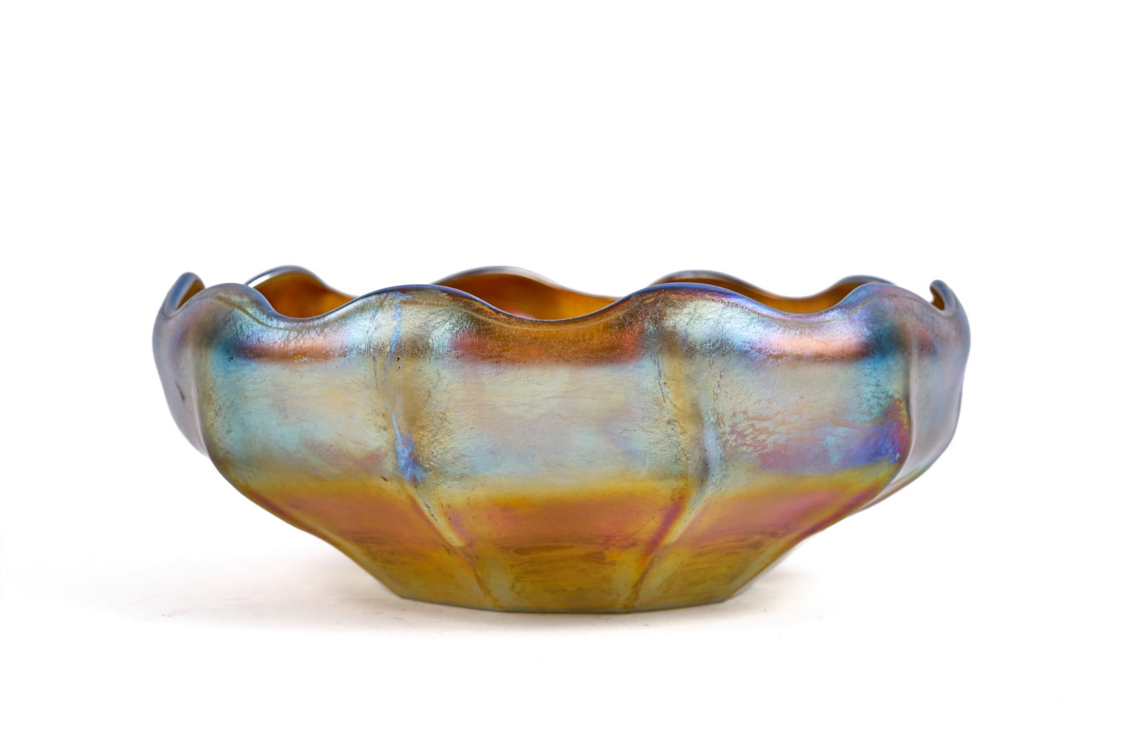 TIFFANY FAVRILE RIBBED BOWL with WAVY RIM: Signed L.C.T. Favrile. 3 1/4 x 8 1/4 inches.