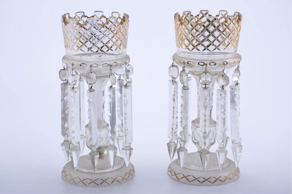 Pair of Victorian Mantle Lusters.: Clear glass with gilt lines and cut glass prisms. 13 1/2" Height. Condition: Needs cleaning. Some wear to gilding.