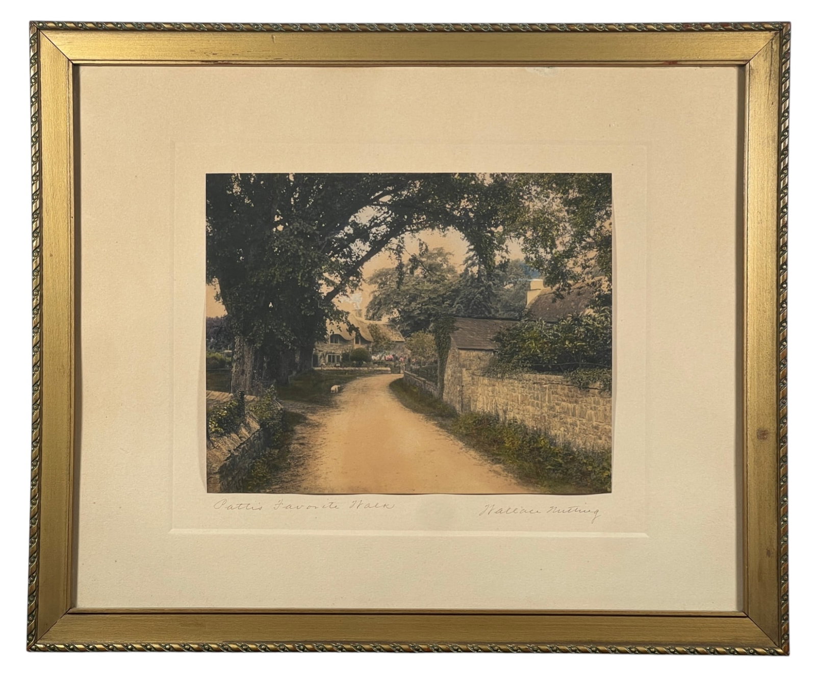 WALLACE NUTTING (1861-1941) European/Dog Scene: "Patti's Favorite Walk", hand colored photograph, hand signed & titled. 14 1/2 x 17 1/2 inches overall. Location: England