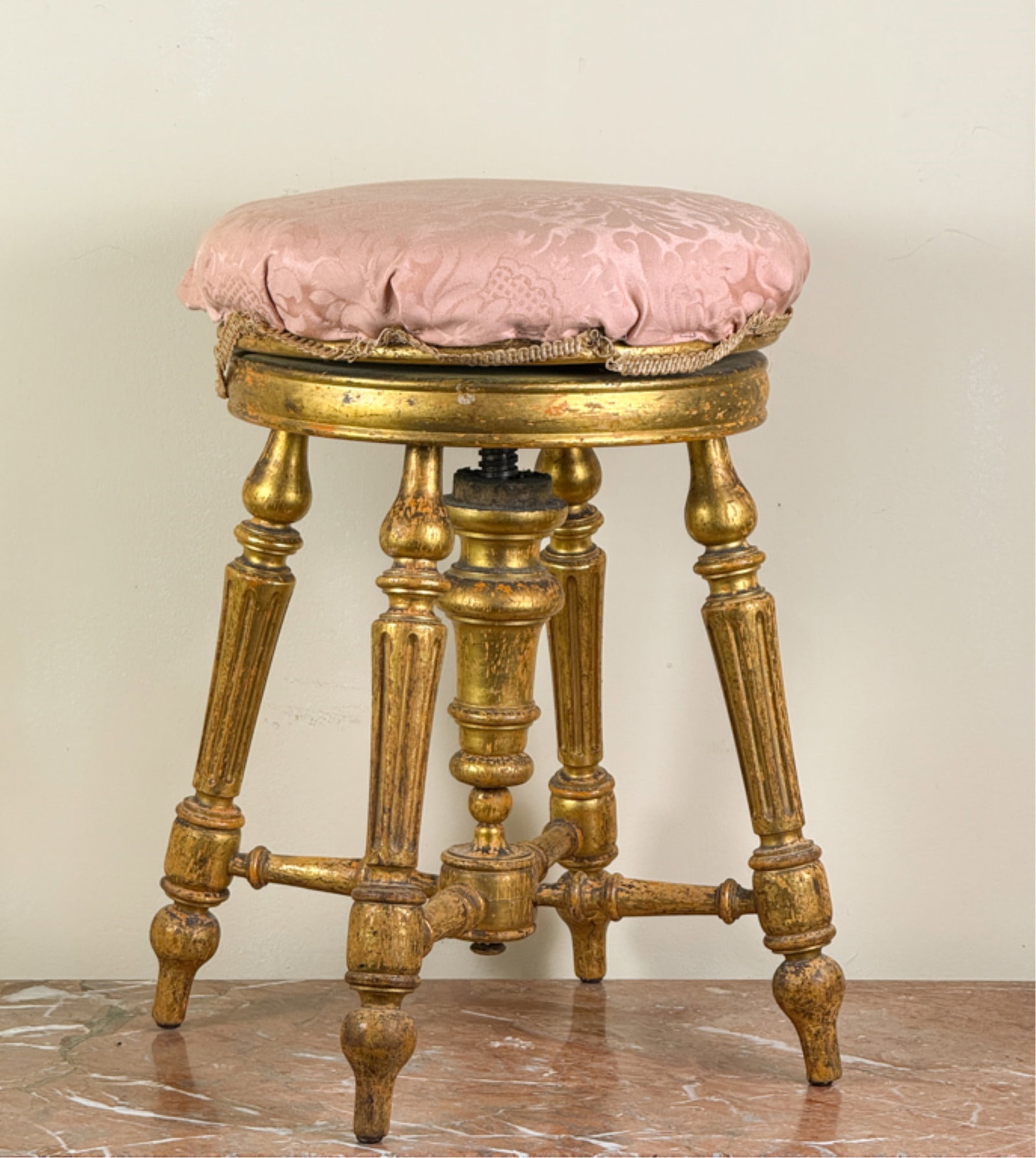 (19thc) FRENCH GILTWOOD PIANO STOOL: On turned and fluted legs. 20 inch height.