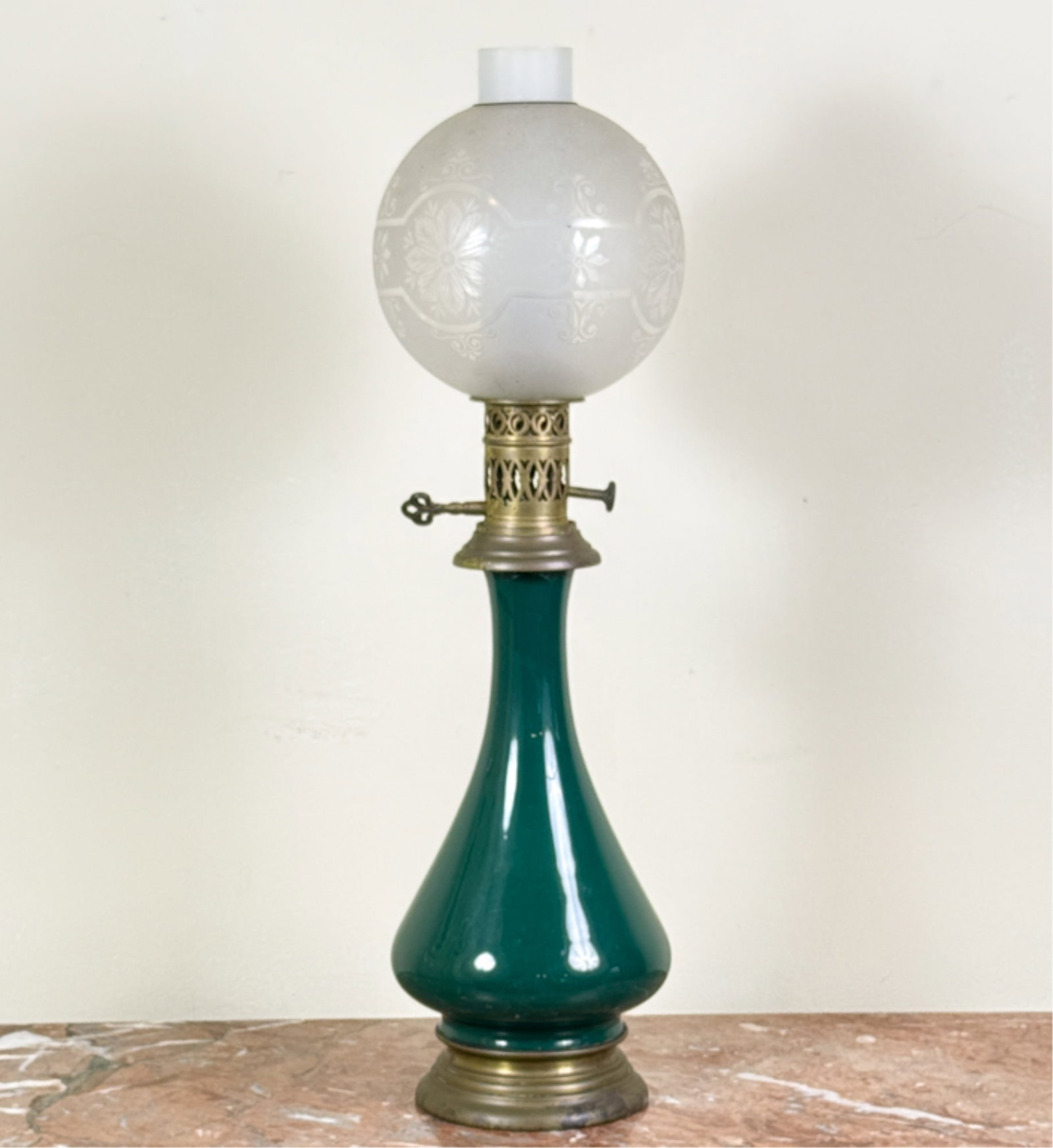 (19thc) FRENCH EMERALD GLASS OIL LAMP: With etched glass shade and brass mounts. 22 1/2 inches.