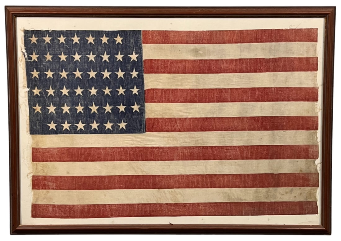 (45) STAR UNITED STATES FLAG: Appears to be painted or stenciled on linen. Framed under glass. 22" x 30 1/2" framed