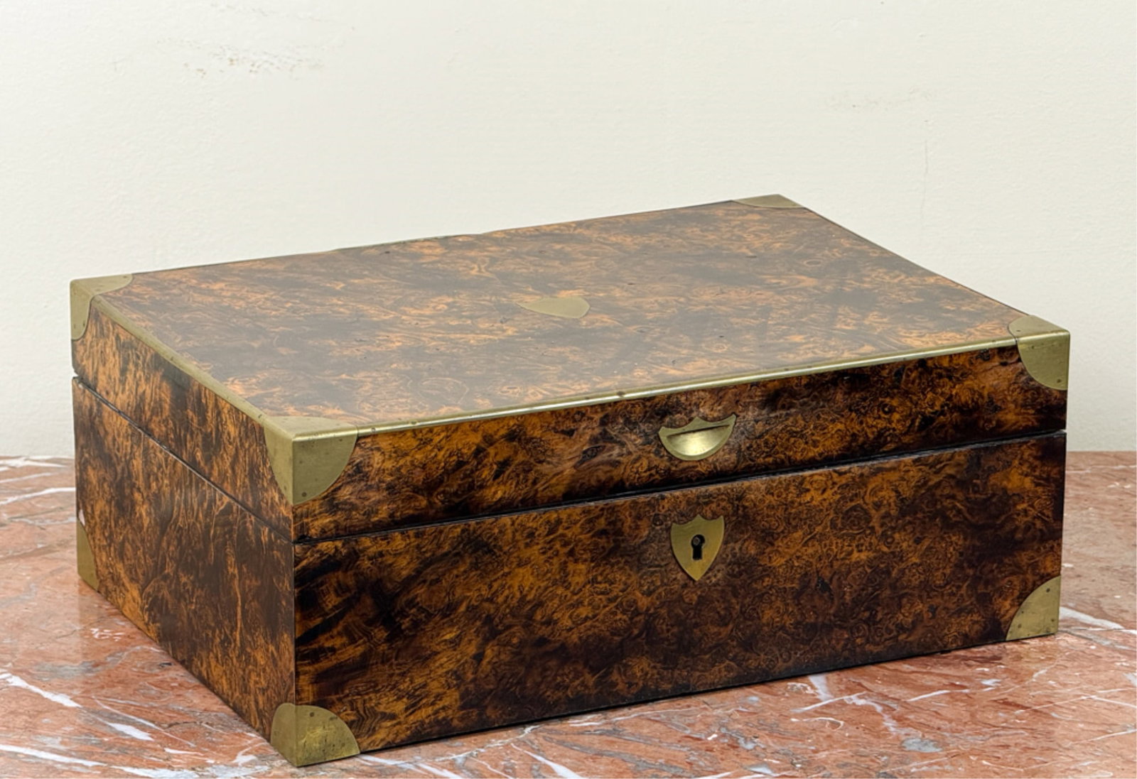 (19thc) BURLWOOD DOCUMENT BOX: With brass shield and adornment. With dyed alligator skin interior. 5 x 12 3/4 x 9 inches.