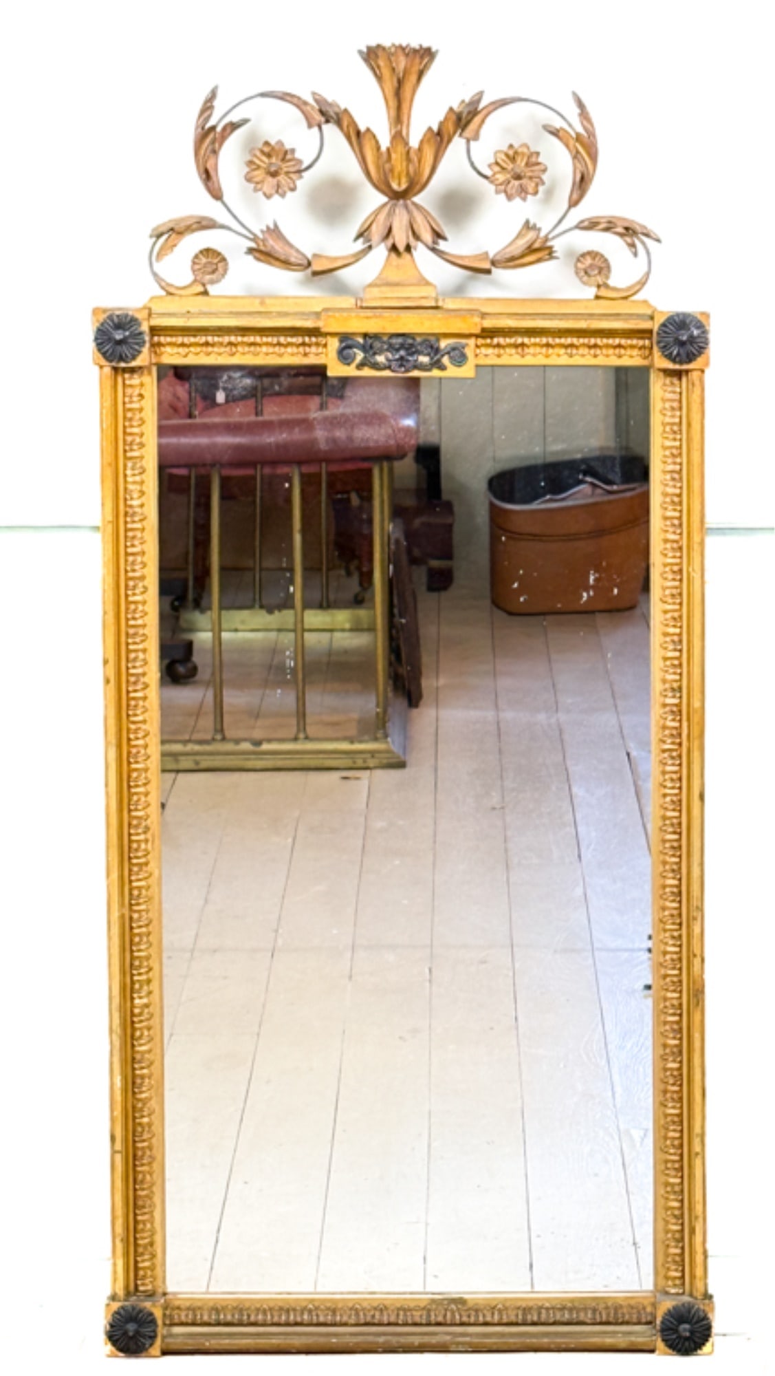 (18thc) FRENCH GILTWOOD MIRROR w CREST: Carved frieze with sunflower medallion and floral crest. 51 x 23 1/2 inches.
