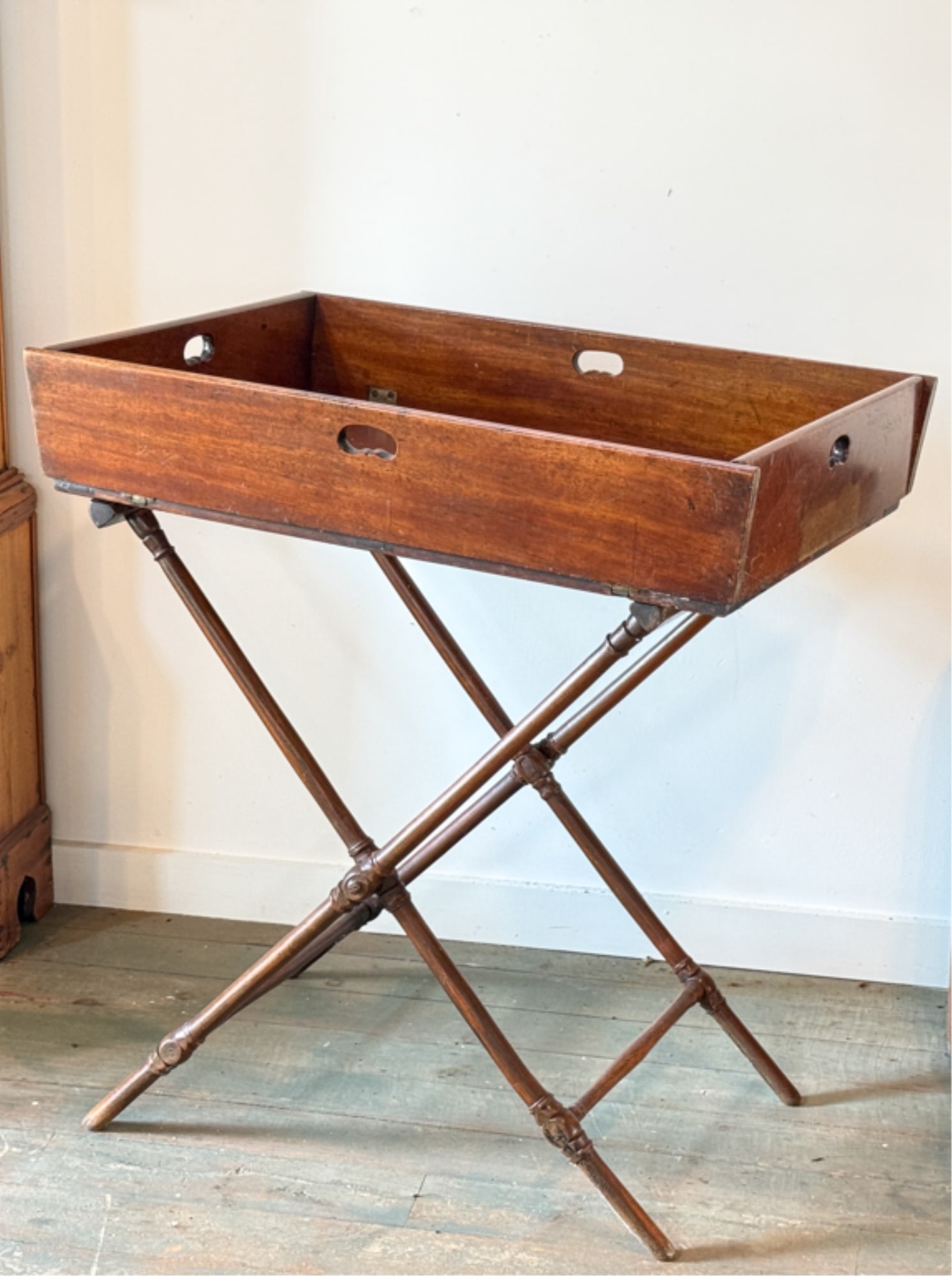 REGENCY MAHOGANY BUTLERS TABLE: On nicely turned base. 32 x 42 x 33 inches.