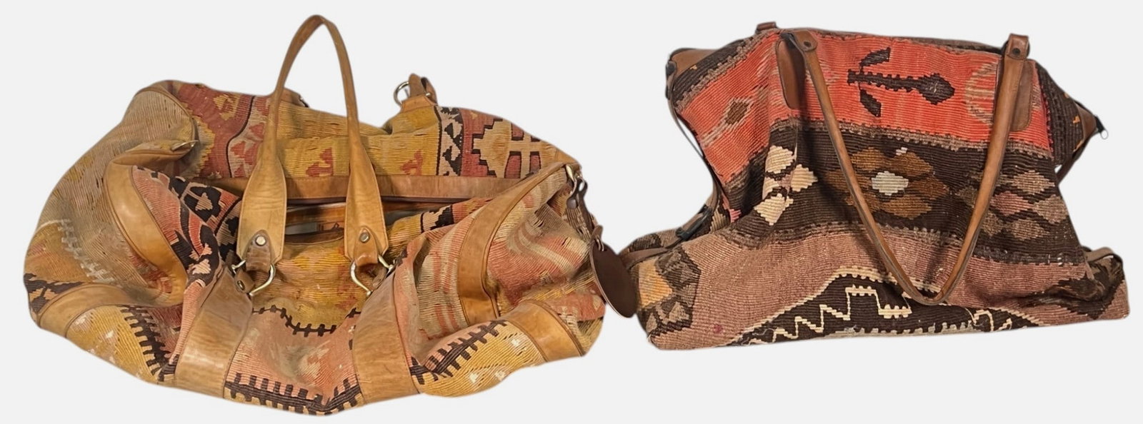 (2) VINTAGE TURKISH KILIM LUGGAGE BAGS: One with Durusel tag, other marked Deki, both made in Turkey. Longest 24"