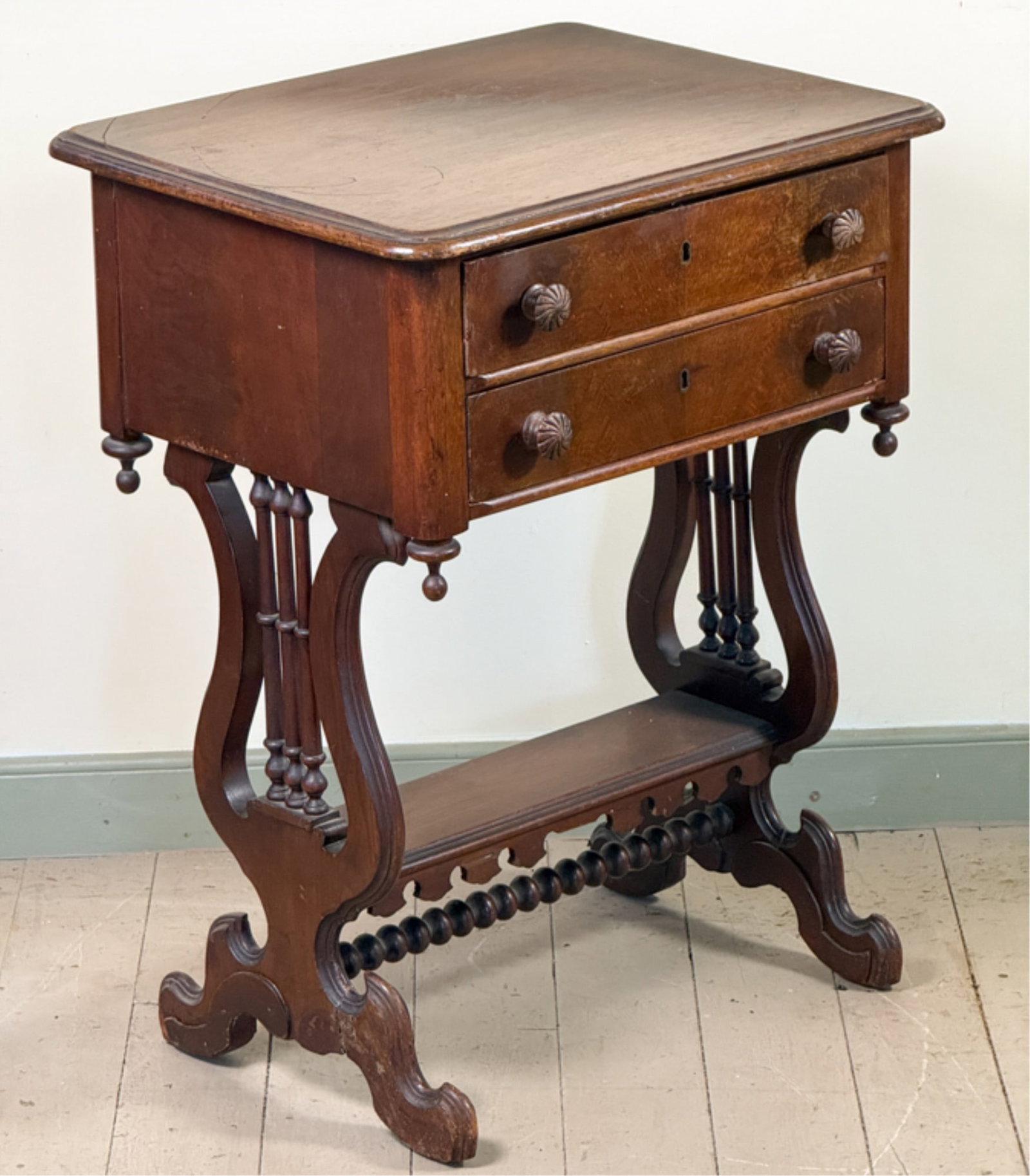 (19thc) TWO DRAWER MAHOGANY SEWING TABLE: With lyre form decoration. 29 x 21 1/2 x 17 1/4 inches.