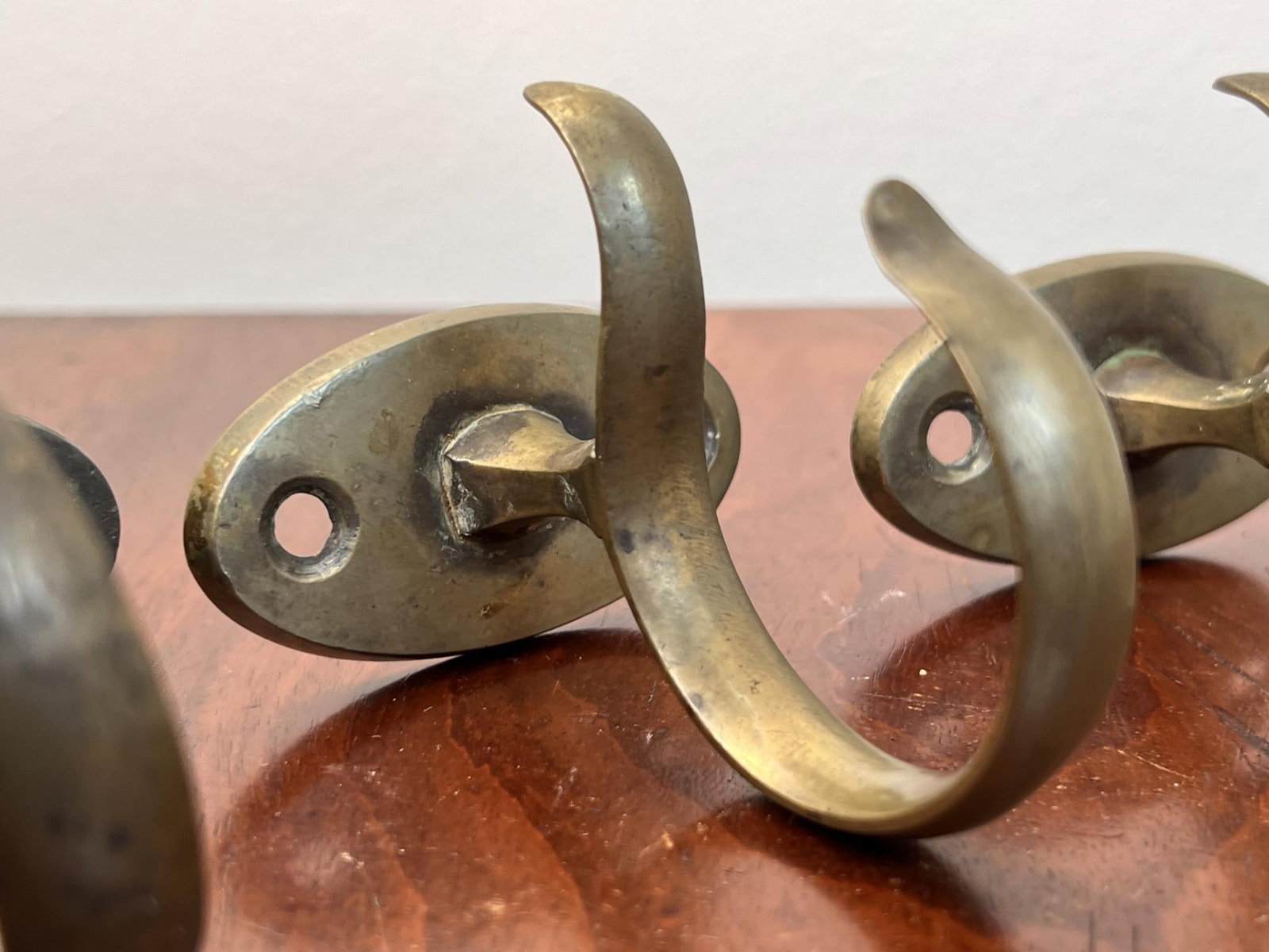 (3) EARLY BRASS JAMB HOOKS - 3