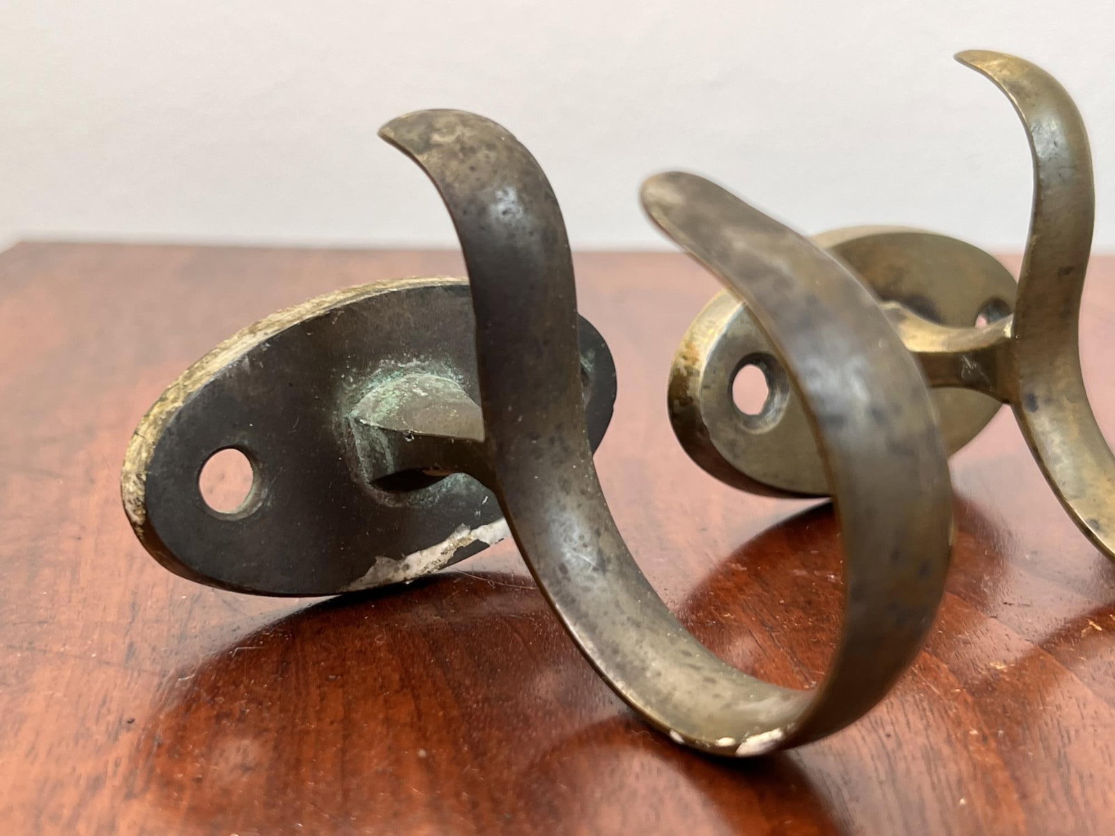 (3) EARLY BRASS JAMB HOOKS - 4