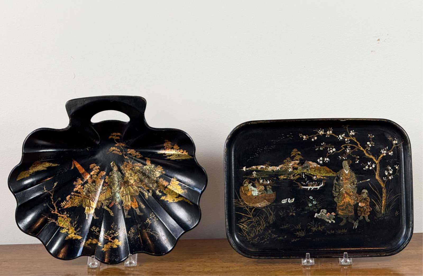 (2) CHINOISERIE LACQUERED SERVING TRAYS: Shell form and another. Widest measures 12 inches.