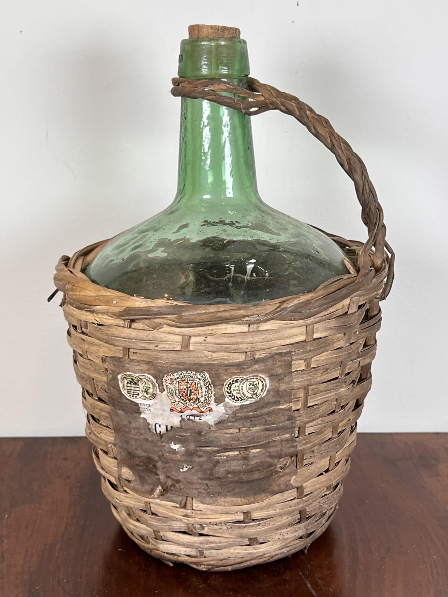 VINTAGE WINE DEMIJOHN IN WOVEN COVER: 12 3/4" tall