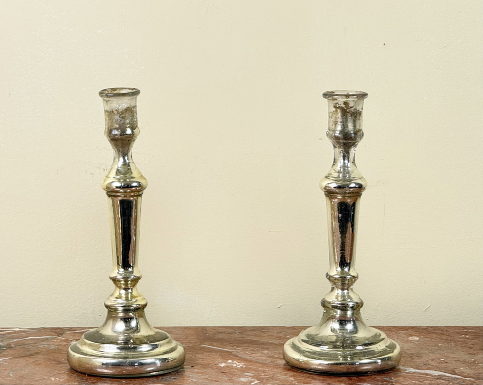 PAIR (19thc) MERCURY GLASS CANDLESTICKS: 11 inch height.