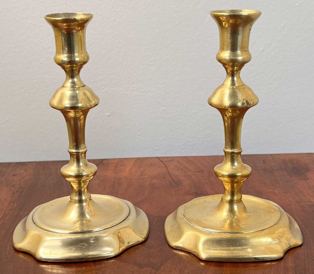 PAIR OF PERIOD GEORGIAN BRASS CANDLESTICKS: Circa 1740. 6 3/4" tall