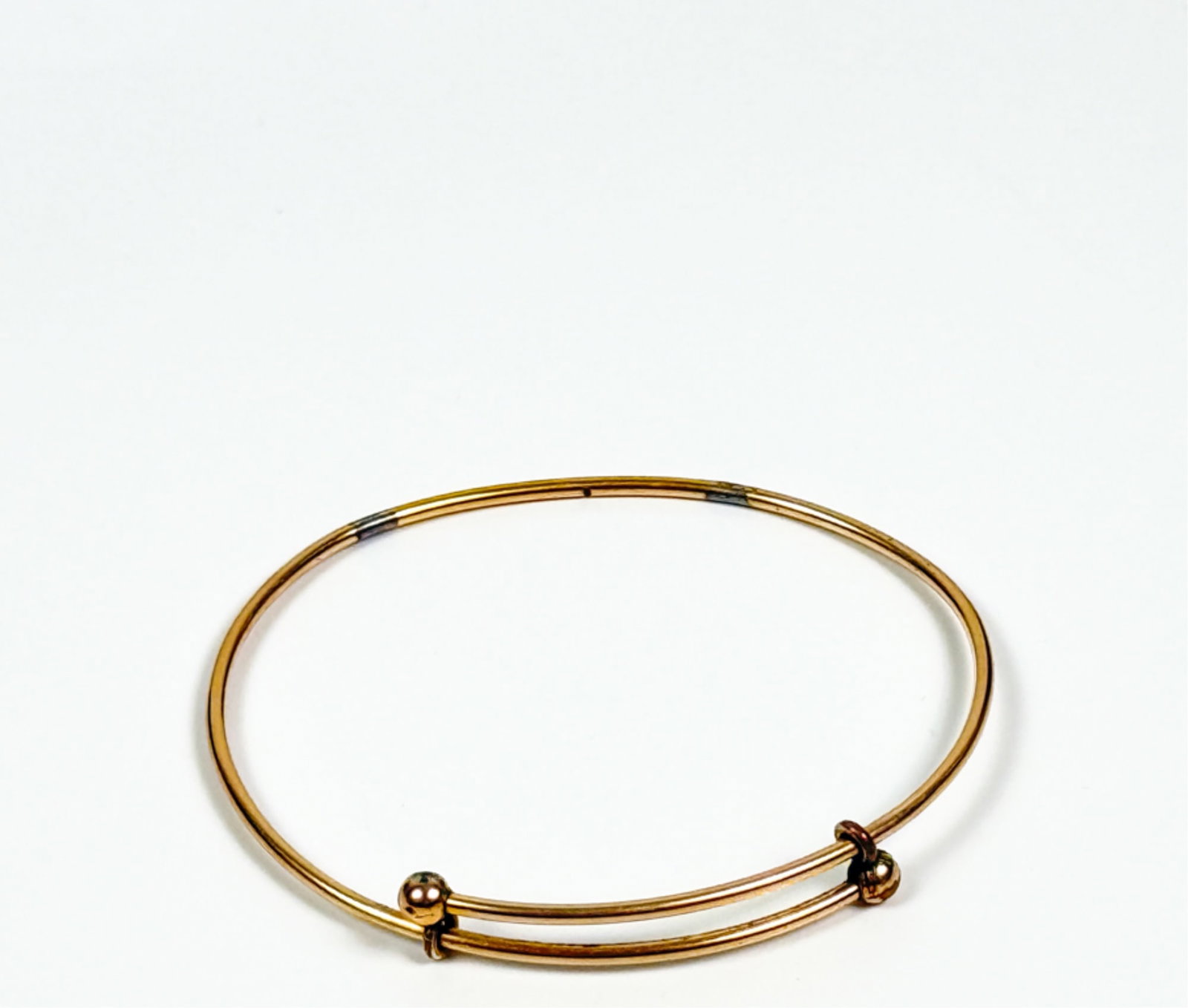 14K MID CENTURY WIRE BRACELET: 2 1/2 inches at widest point. Tests at 14k. 4.67 grams.