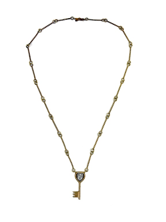 14K GOLD & DIAMOND "KEY TO MY HEART" NECKLACE: With 5 x 5 mm solitaire diamond. Chain and drop marked 14k. 9 inch length. 8.87 grams.