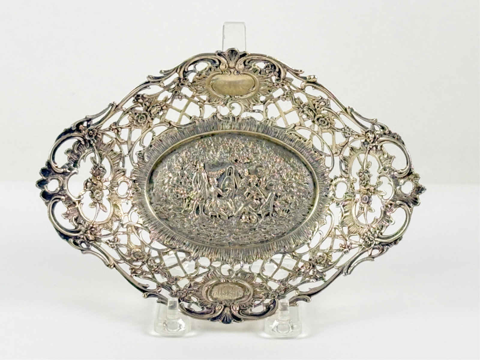 CONTINENTAL SILVER RETICULATED BASKET: With romantic scenes. 7 3/4 inches. 3.95 ozt.