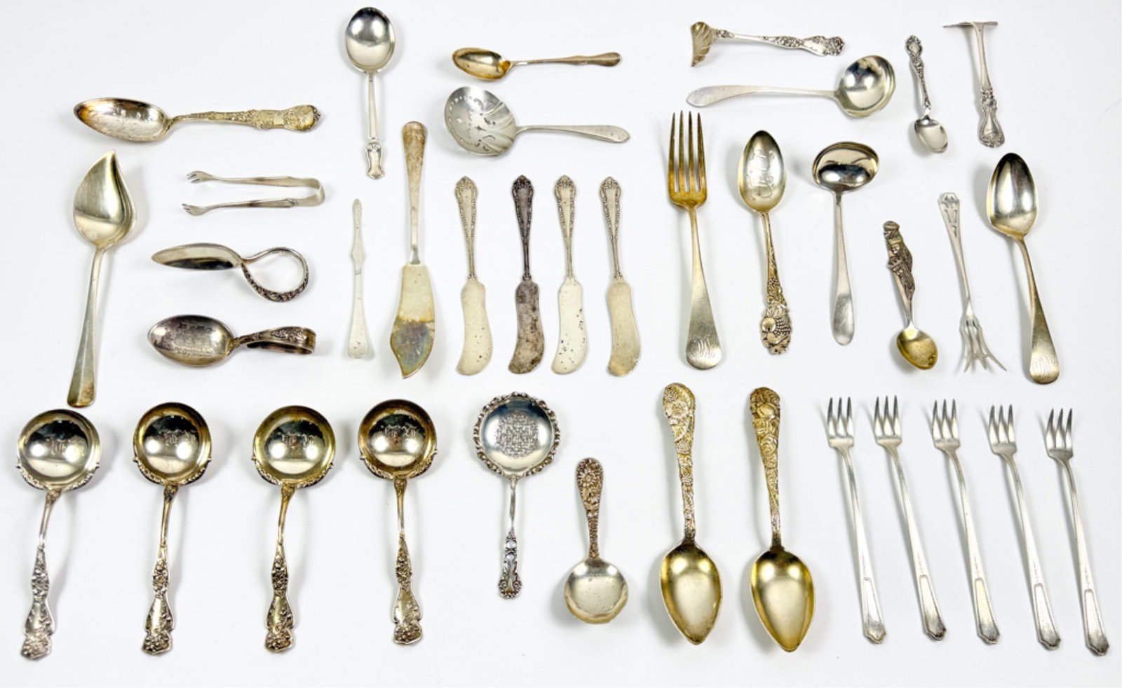 GENEROUS GROUPING STERLING SILVER FLATWARE: Souvenir, Ice Cream spoons, Kirk, etc. See photos. 24.05 ozt.