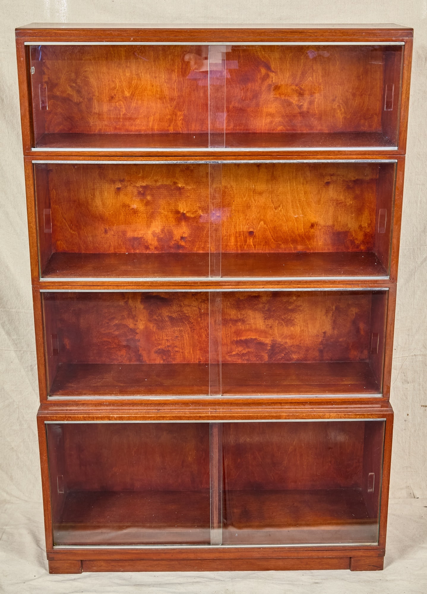 MINTY LIBRARY SPECIALISTS BARRISTER-STYLE BOOKCASE: (4) Modular stacking bookcases which screw together. mahogany. 55 x 35 x 11 1/2 inches (overall)