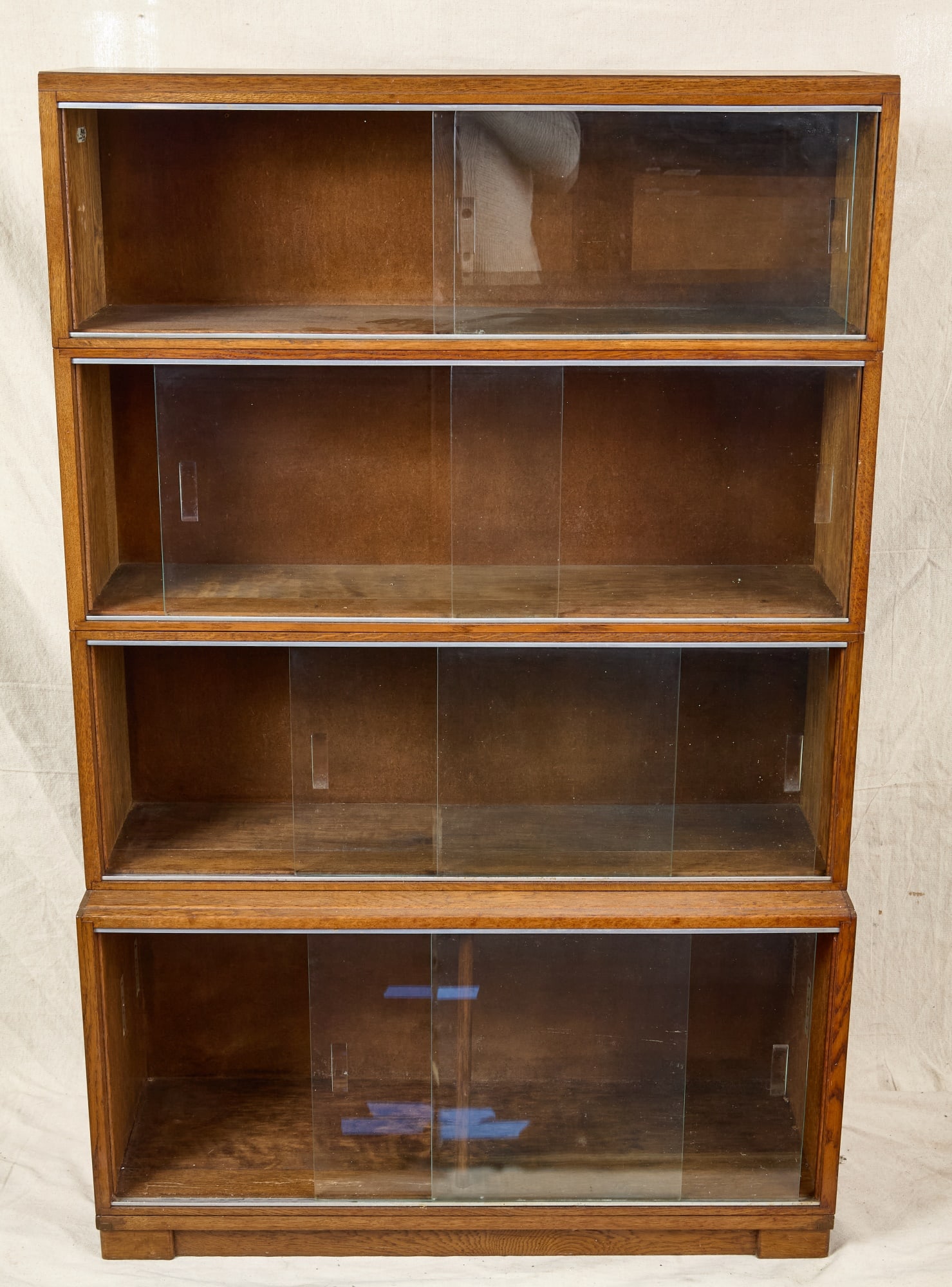 MINTY LIBRARY SPECIALISTS BARRISTER-STYLE BOOKCASE: (4) Modular stacking bookcases which screw together. oak. 55 x 35 x 11 1/2 inches (overall)