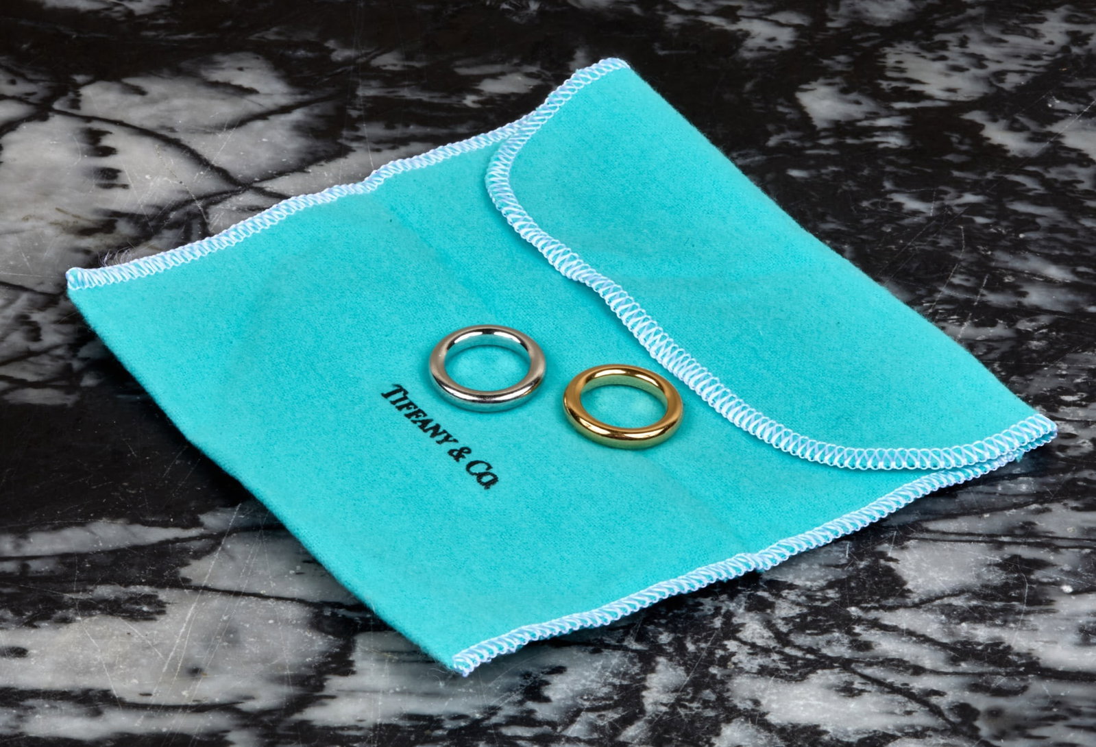 (2) TIFFANY and CO 18K WHITE and YELLOW RINGS: Size 5.5. 13.9 dwt