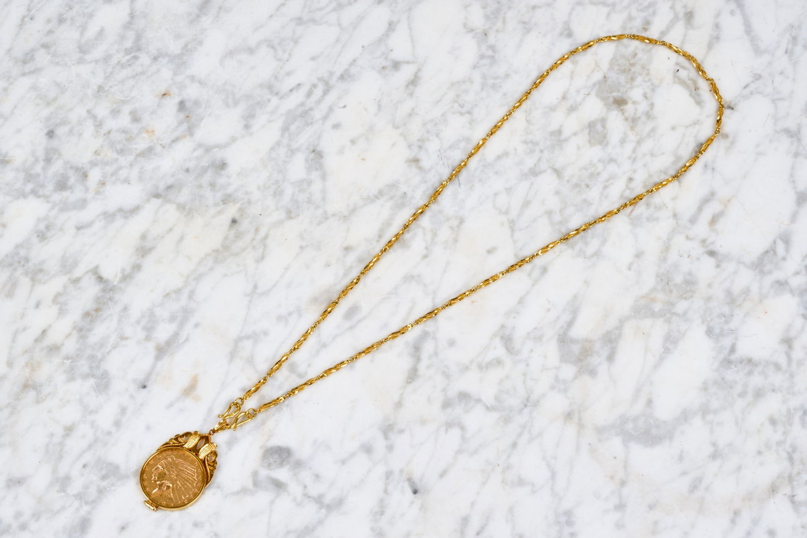 1915 US (5) DOLLAR GOLD PIECE PENDANT: Set in 20k yellow gold on 21 inch long chain. 14.8 dwt gross weight.