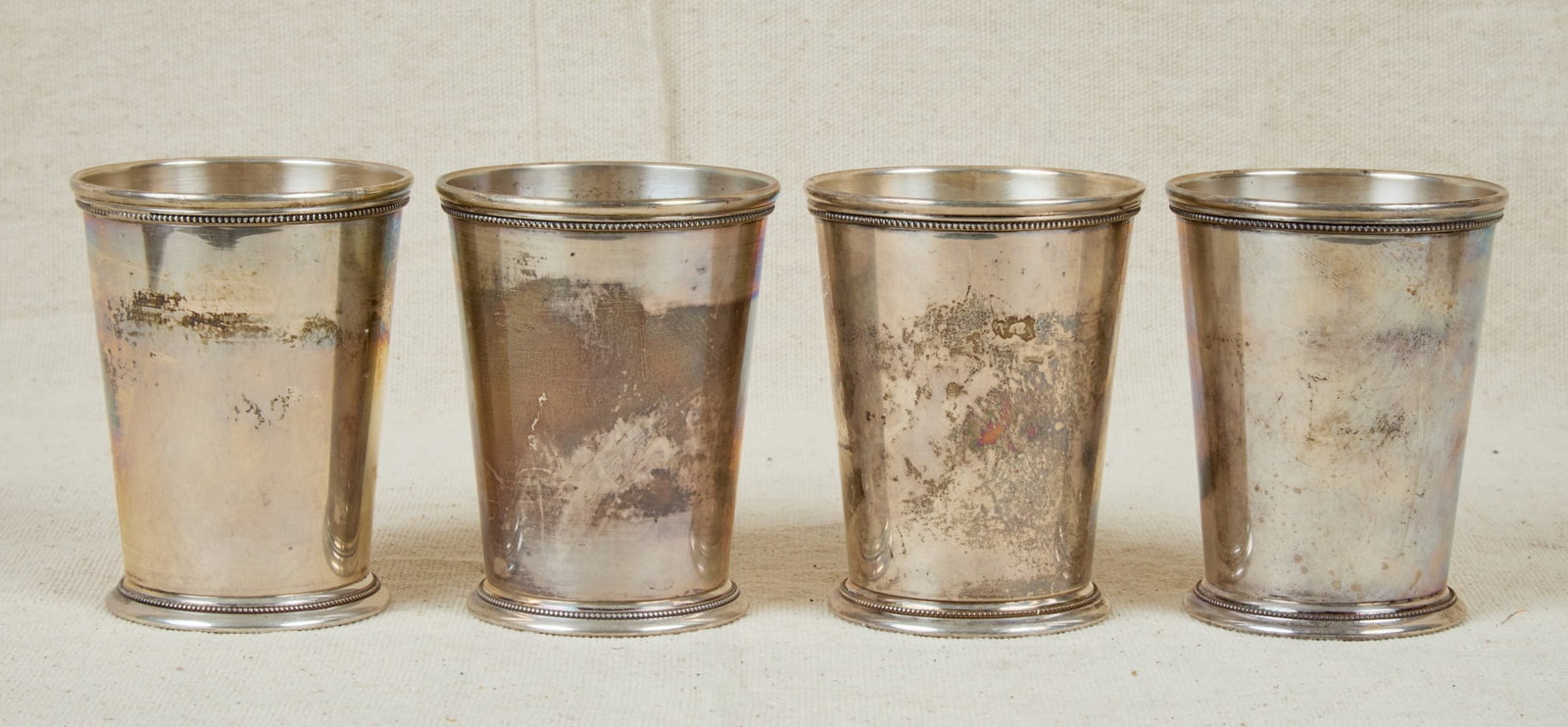 (4) INTERNATIONAL STERLING SILVER JULIP CUPS: "Patrick Henry" 4 x 3 1/4 inches. 19.53 troy ounces