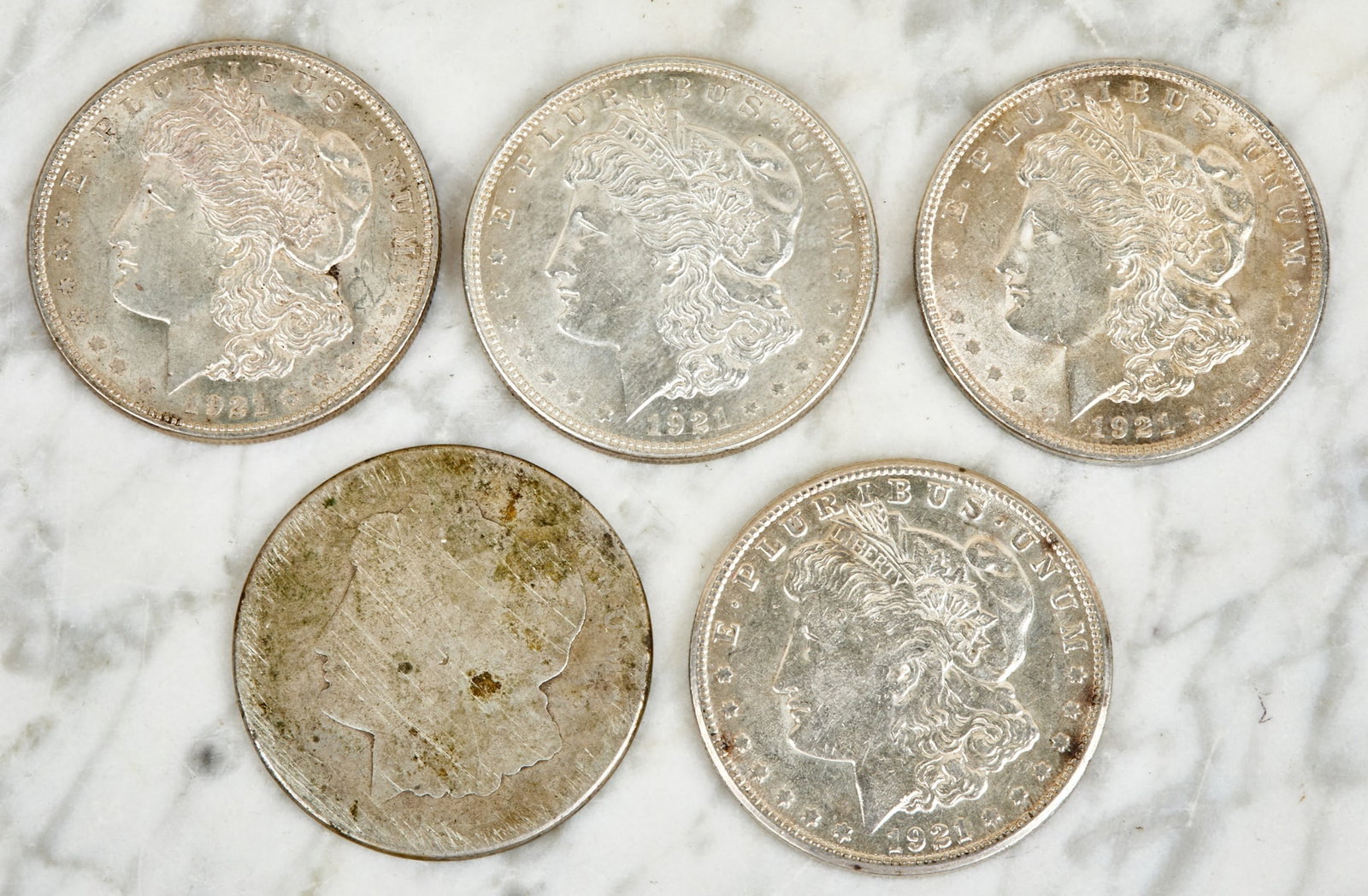 (5) MORGAN US SILVER DOLLARS: (4) 1921 & (1) 1921S. 1 1/2 inches.