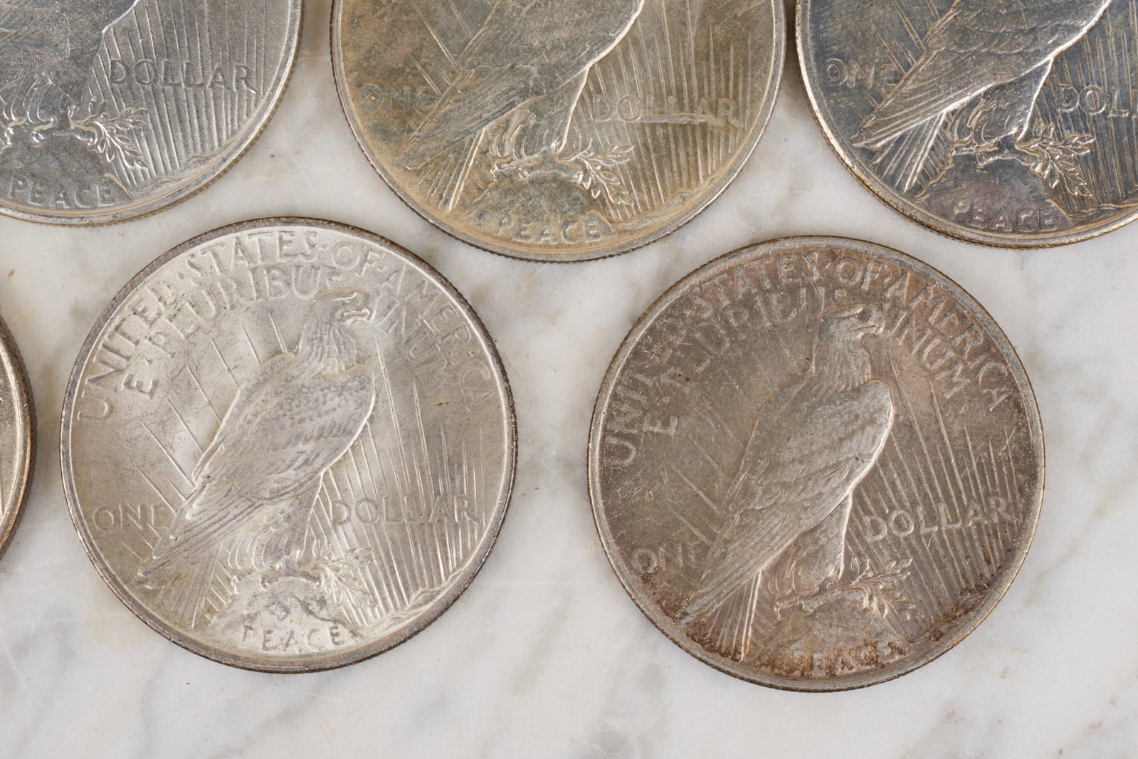 (7) US PEACE SILVER DOLLARS - 10