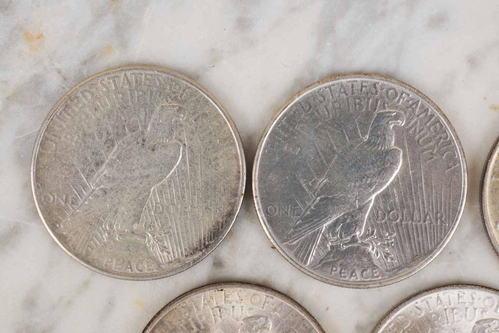 (7) US PEACE SILVER DOLLARS - 7