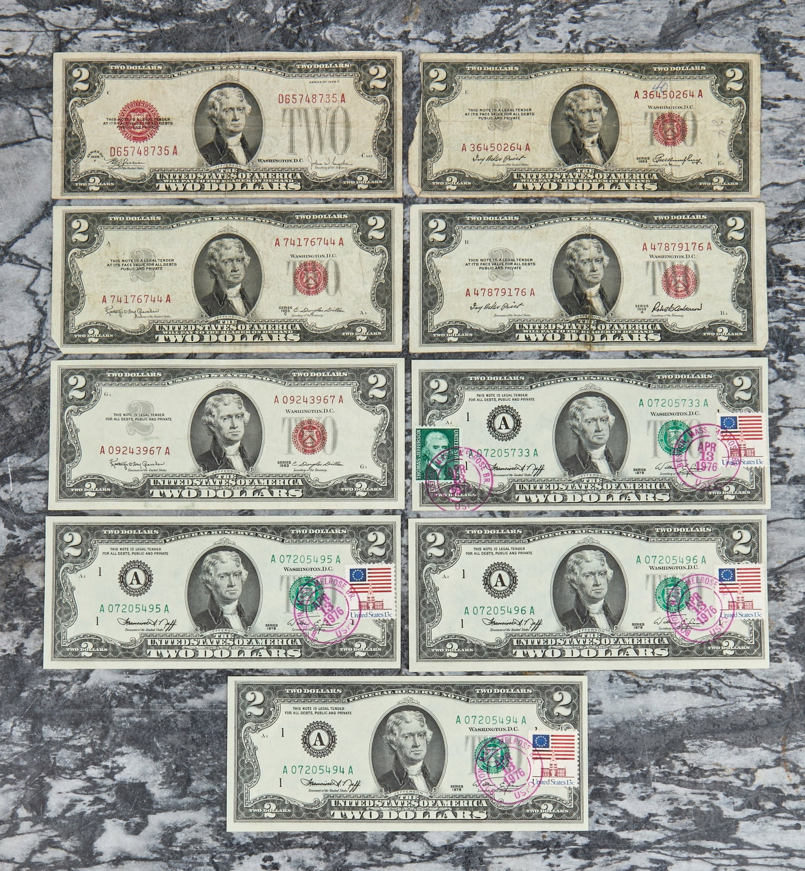 (9) TWO DOLLAR US BILLS: (1) 1928, (3) 1953, (1) 1963, and (4) 1976 stamped First Day of Issue - including (3) in sequential order. 2 1/2 x 6 inches.