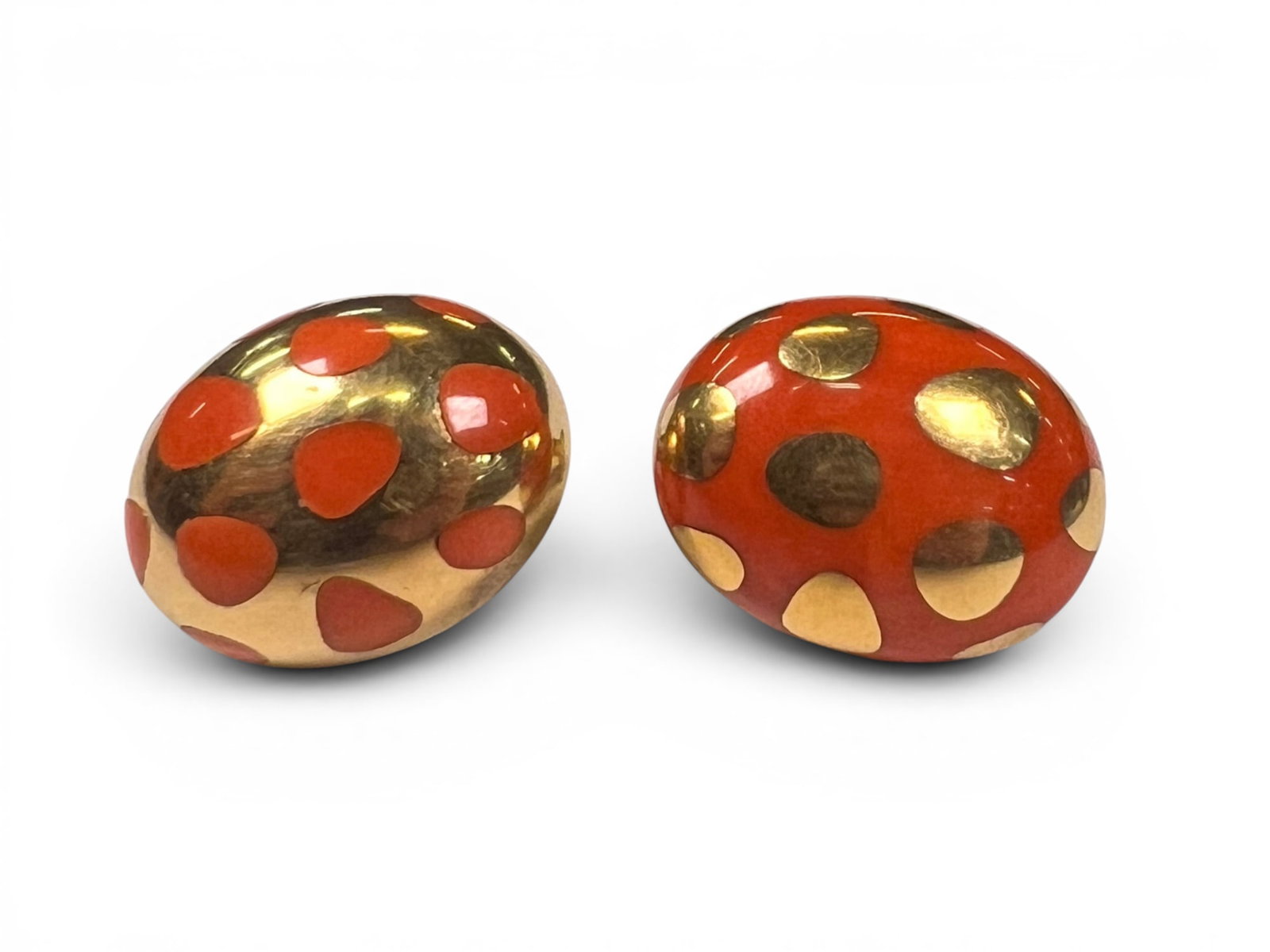 TIFFANY & CO, ANGELA CUMMINGS 18K GOLD EARRINGS: Angela Cummings for Tiffany & Co 18k gold and coral "positive and negative earrings". Marked T & Co 18k, Signed with a "C". 7/8" long. 13 dwt overall Condition: Good