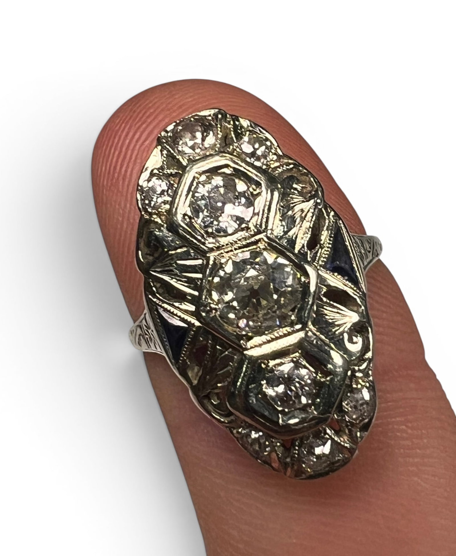 14K WHITE GOLD DIAMOND & SAPPHIRE ART DECO RING: Tests as 14k. (3) central diamonds flanked by smaller diamonds and small sapphires. 4.6 dwt overall. Size 7 1/2 Condition: Good