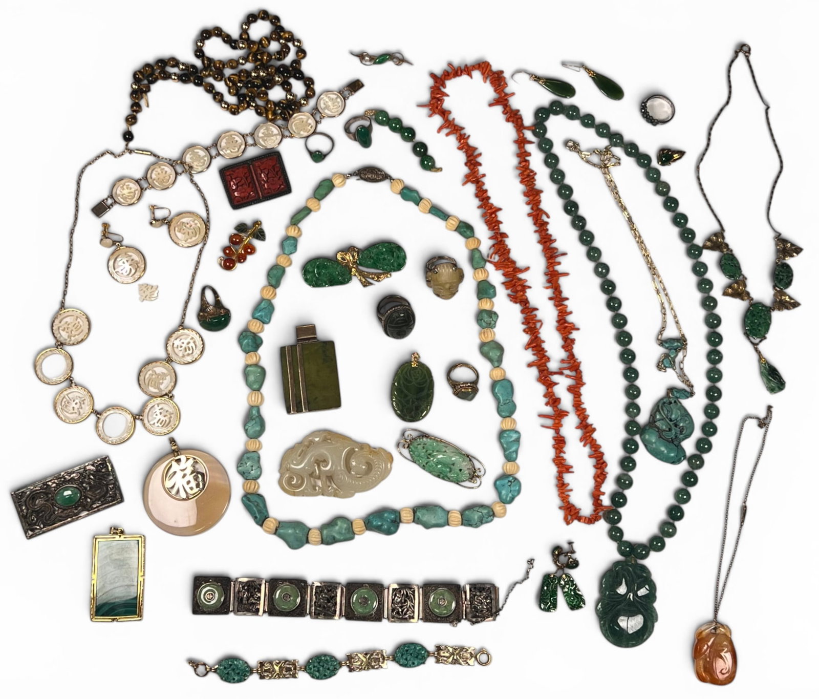 GROUPING OF JADE/HARDSTONE JEWELRY ETC: Some silver and gold filled settings. Largest carved jade plaque 3" long Condition: Wear consistent with age and use
