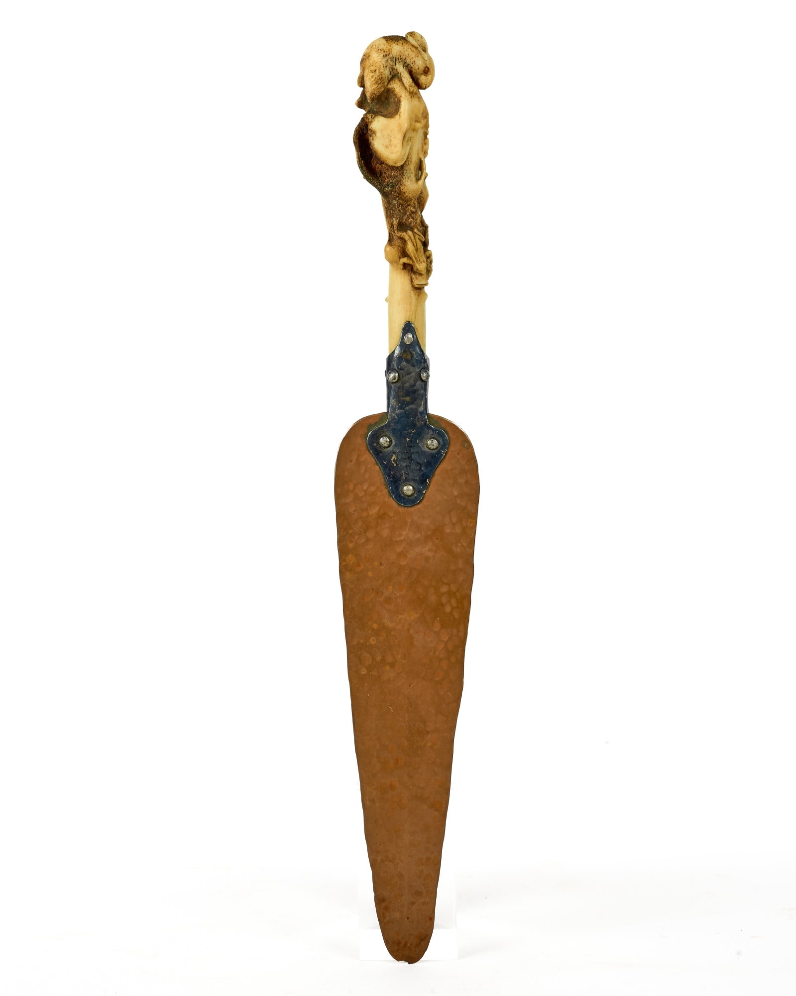 JOSEPH HEINRICHS CARVED STAG ANTLER LETTER OPENER: Joseph Heinrichs Arts & Crafts letter opener with hand hammered copper blade, silver collar, & carved stag horn handle with rabbit finial & frogs. 13 1/2 inches.