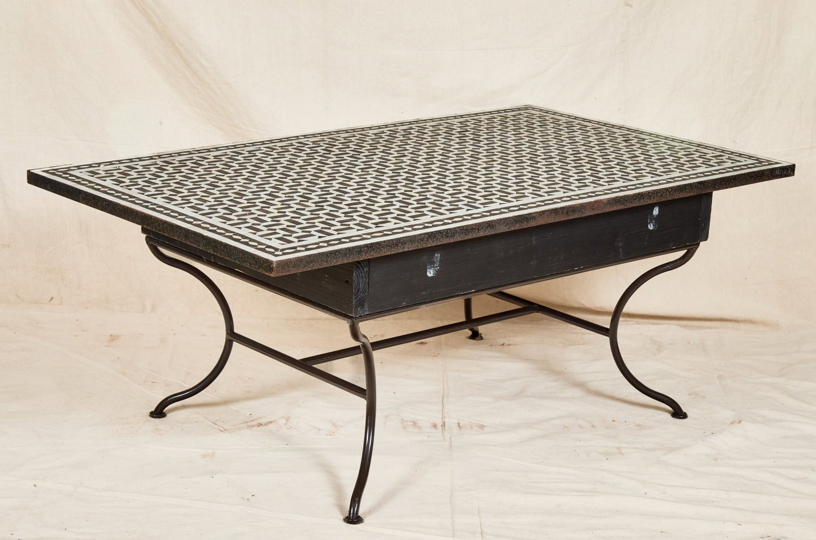 VINTAGE MOROCCAN MOSAIC TILE TOP TABLE: With six (6) chairs with fitted decorative cushions. Table sits on low iron base with added removable wooden riser. Pair triangular back arm chairs and (4) high back arm chairs. Custom made tufted cus