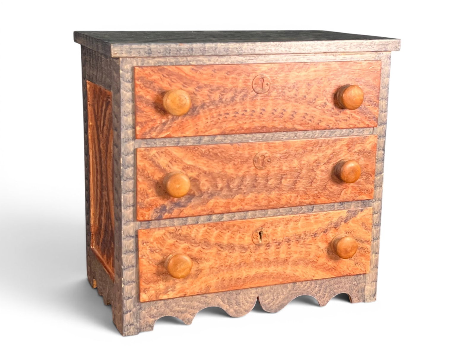 C.J. HOPF GRAIN PAINTED MINIATURE (3) DRAWER CHEST: With original C.J. Hopf, Kennebunk, ME paper label under drawer and one drawer pencil signed. 11 1/2" x 12" x 7 1/2"