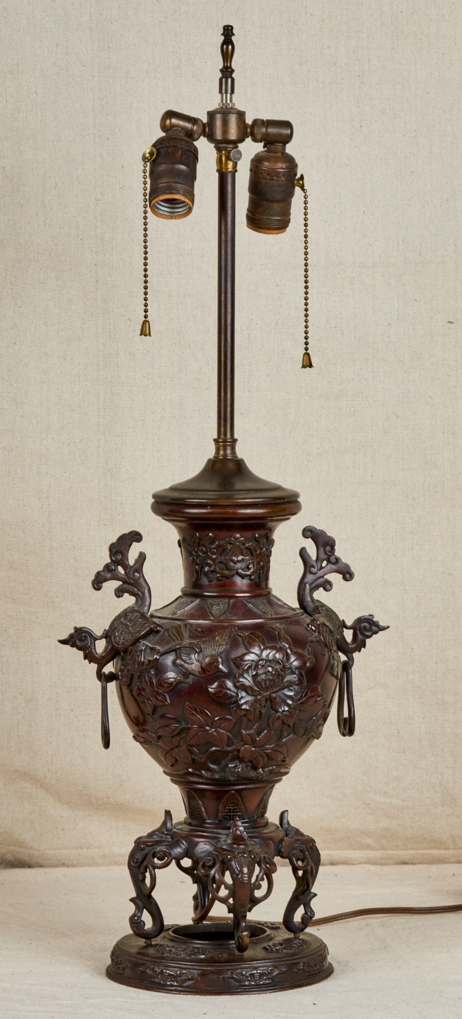 (19th c) CHINESE BRONZE URN: With figural bird handles. Fitted as lamp. 27 inches to finial; urn 13 1/2 inches. Provenance: Descended from silent movie actor Charles Murray.
