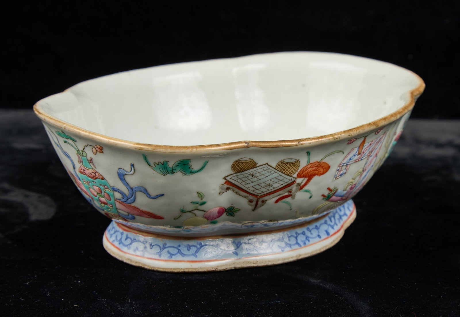 SIGNED FAMILLE ROSE LOBED PORCELAIN DISH: (19th/20th c) lobed porcelain dish hand painted with Chinese symbology and gilt rim, signed in character under base. 2 1/2 x 8 1/4 x 6 3/4 inches.