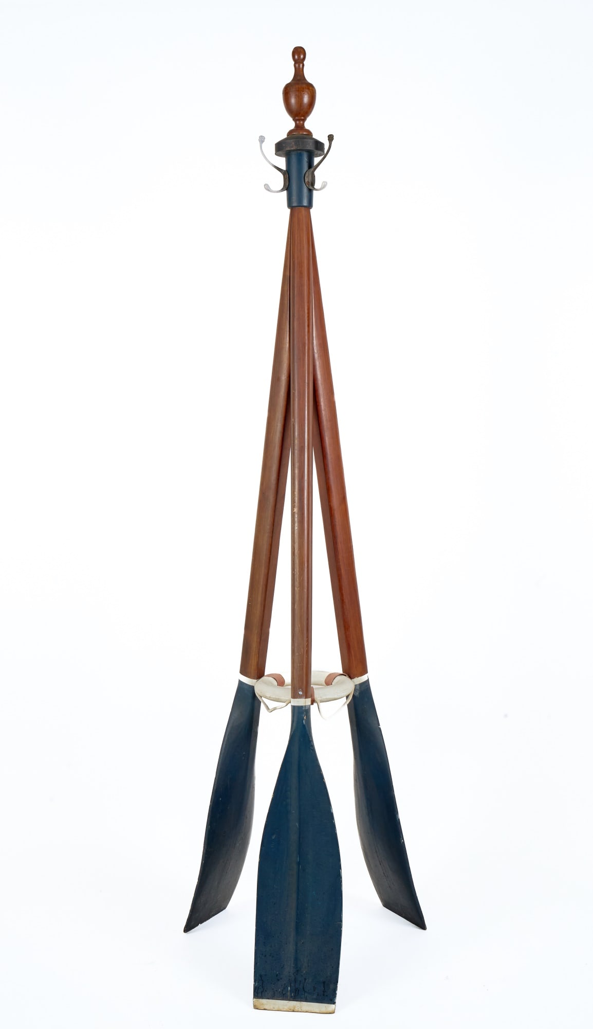 COAST of MAINE NAUTICAL FOLK ART HAT/COAT RACK: Turned urn finial, (3) painted oars, painted wooden life ring. 85 x 22 inches.