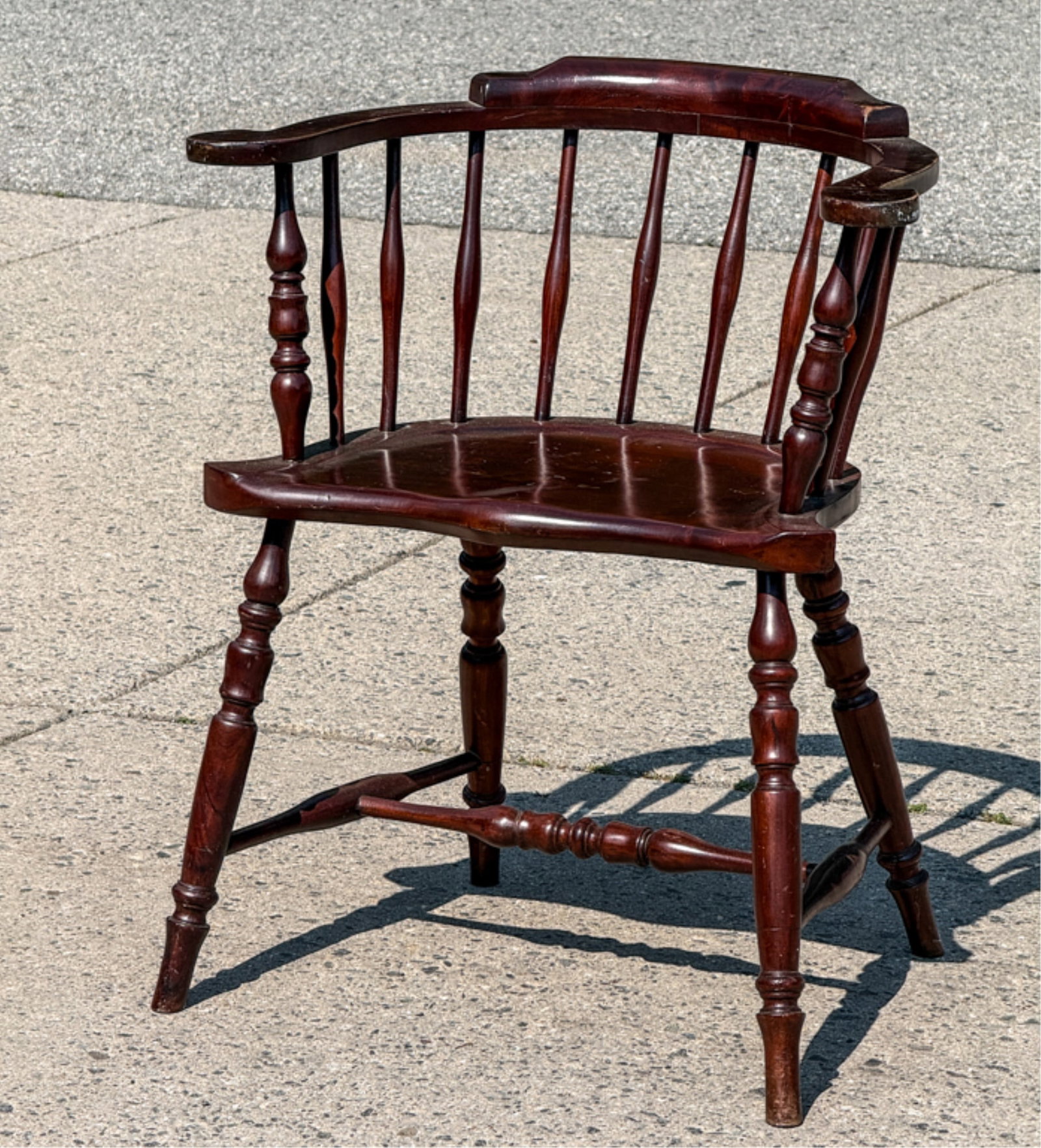 MAHOGANY CAPTAINS CHAIR: Shaped seat, finely turned supports. 31 1/2 x 23 1/2 x 19 1/2 inches.