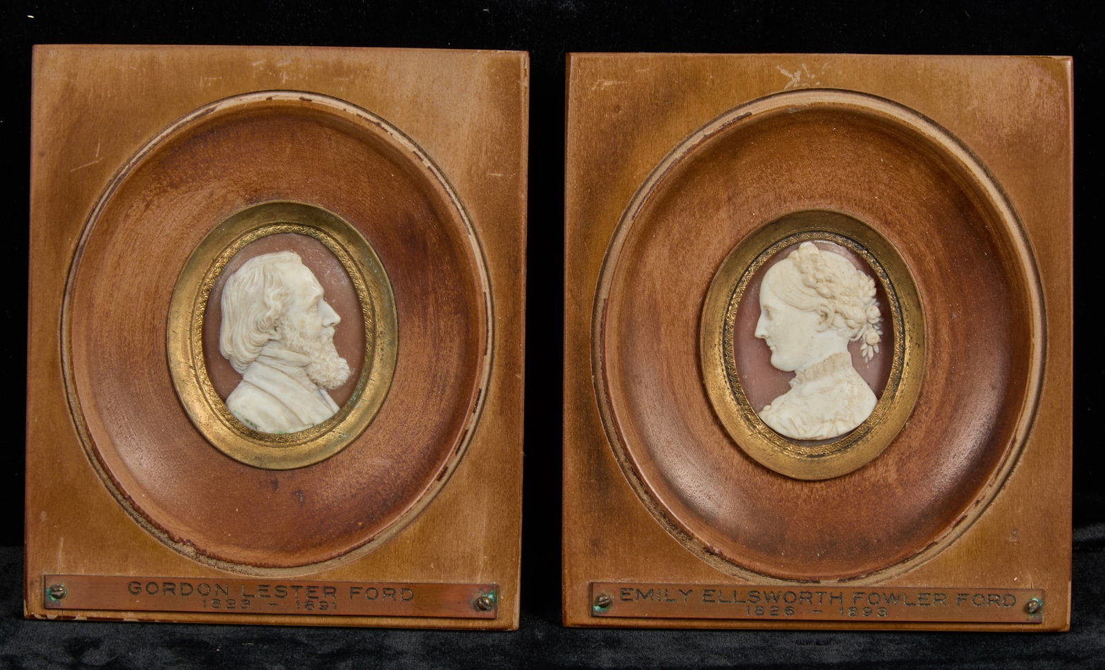 (2) SHELL CARVED CAMEOS - GORDON & EMILY FORD: (19th c) shell carved cameos of Gordon Lester Ford and Emily Ellsworth Fowler Ford with bronze name plaques. Together with a letter from Homer Saint-Gaudens, former director of the Carnegie Institute 