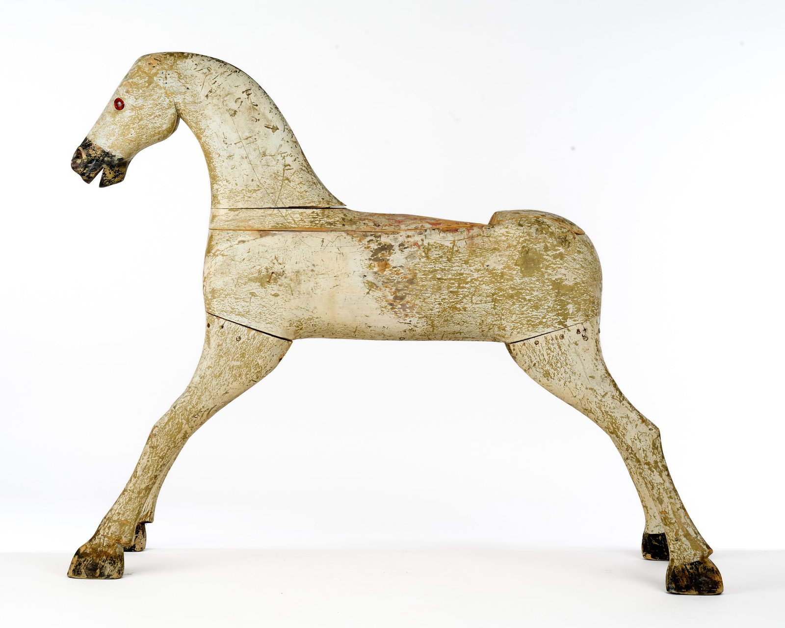 (Late 19th c) ROCKING HORSE FRAGMENT: Carved and painted wood with glass eyes. 34 x 42 x 10 inches
