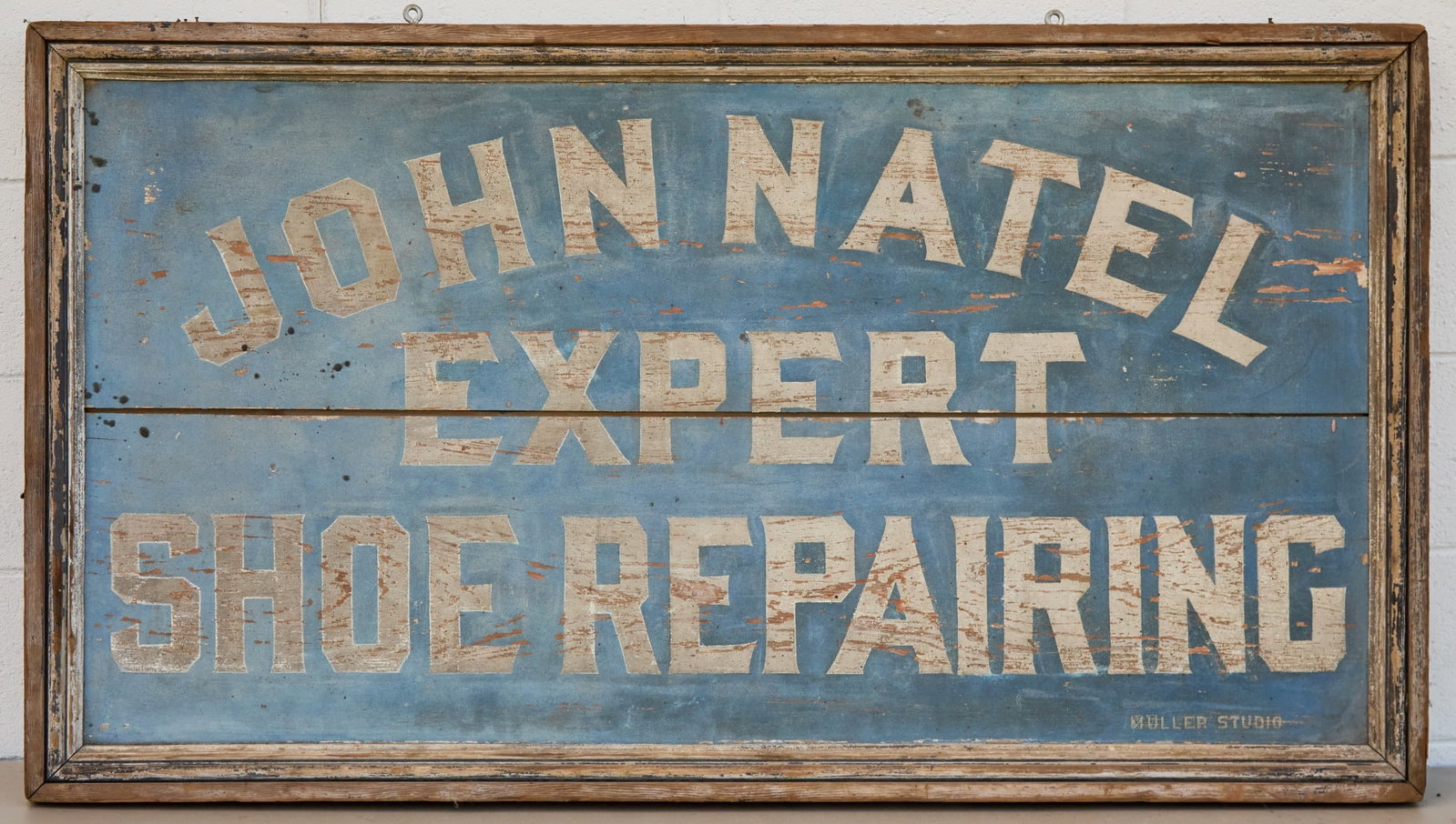 (2) SIDE JOHN NATEL EXPERT SHOE REPAIRING - SIGNED: 19th c A large double sided (19th c) painted wooden trade sign with great old blue sand textured paint with white lettering, made by Muller Studio. 30 x 54 x 2 1/2 inches.