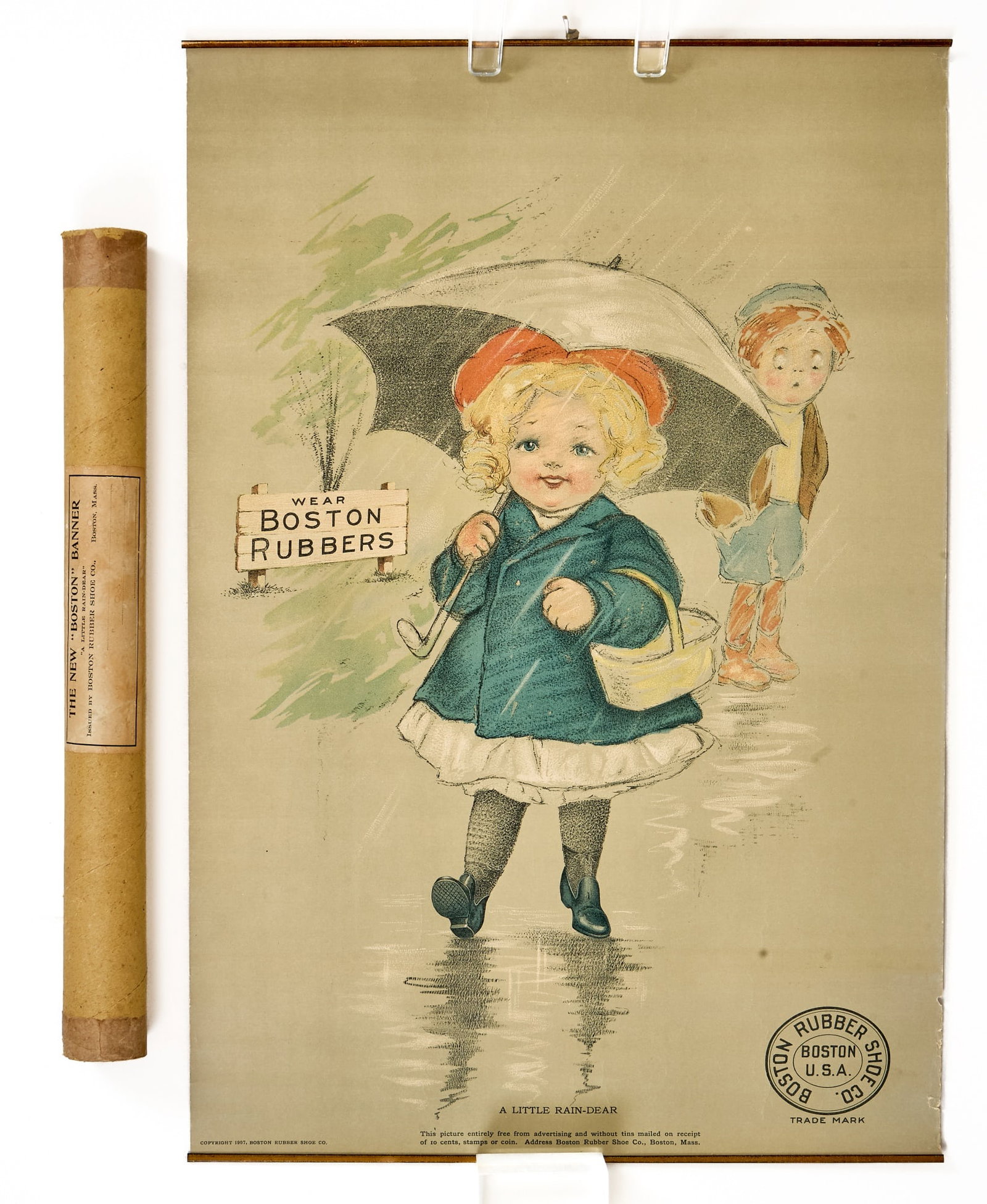 1907 "WEAR BOSTON RUBBERS" BOSTON RUBBER LITHO AD: 1907 Boston Rubber Co. "Wear Boston Rubbers/A Little Rain-Dear" lithograph ad poster, with original shipping tube. 22 x 15 inches.