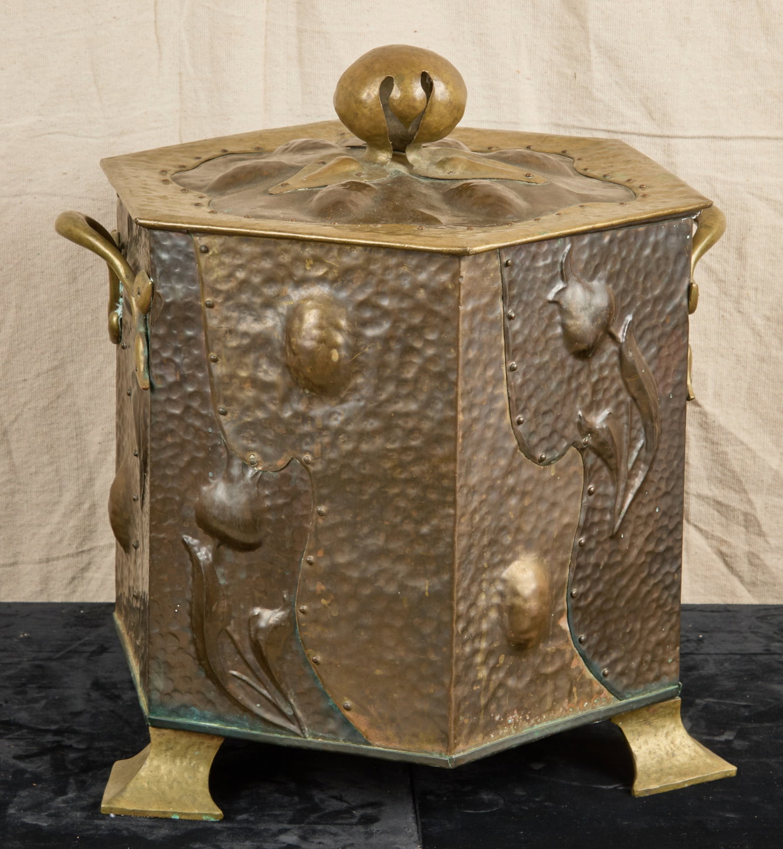 ART NOUVEAU BRASS & COPPER COAL SCUTTLE: Hand hammered brass & copper coal scuttle with flowing floral Art Nouveau motifs. 17 x 16 x 16 inches.