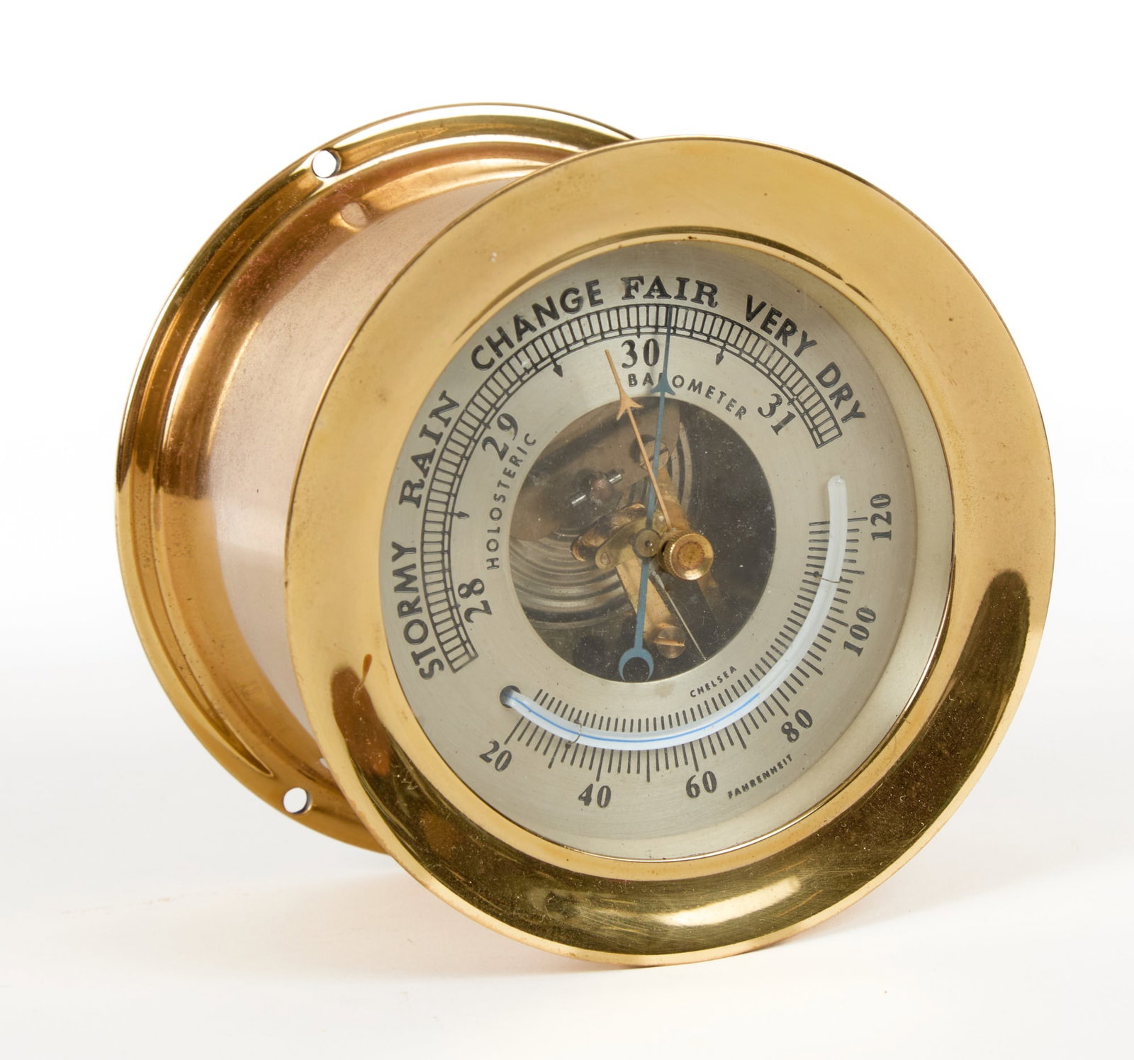 CHELSEA CLOCK CO. BRASS BAROMETER: 4 3/4 inch brass case, 3 1/4 inch engraved silver face. Serial no. 2?67. 4 3/4 x 3 1/4 inches.