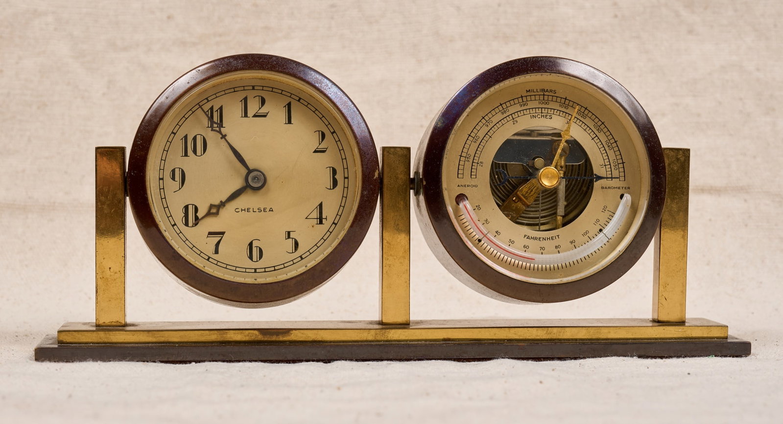 DESKTOP CHELSEA SHIP'S BELL & BAROMETER: With bronze case. 4 x 9 1/4 inches.