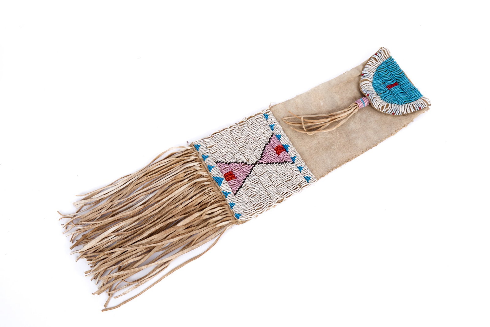 PLAINS INDIANS BEADWORK PIPE BAG: Plains Indians buckskin pipe bag with geometric polychrome beadwork. 21 x 5 1/2 inches.