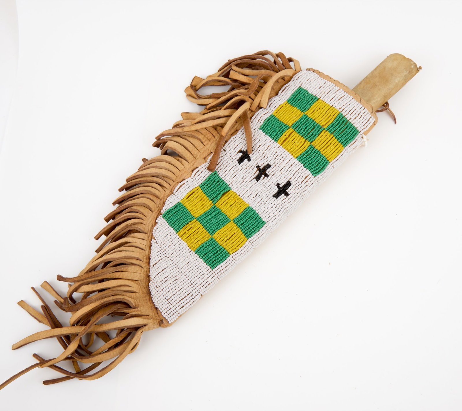 PLAINS INDIANS KNIFE with BEADWORK SHEATH: Simple knife with rawhide grip, fringed buckskin sheath with geometric polychrome beadwork including crosses & checkerboards. 11 inches excluding fringe.